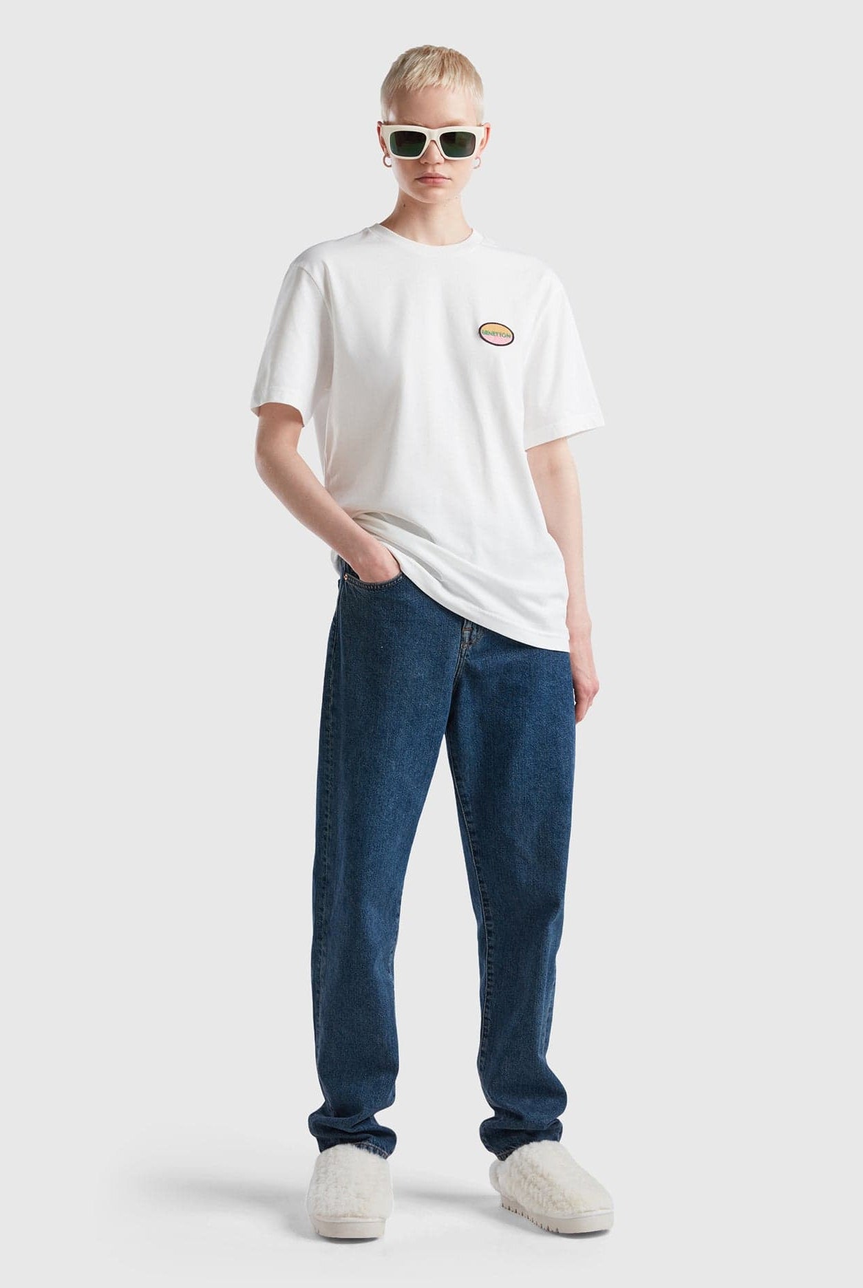 يونايتد كولورز اوف بينيتون تيشيرت أزرق سماوي مع بادج نص كم مناسب للجنسين