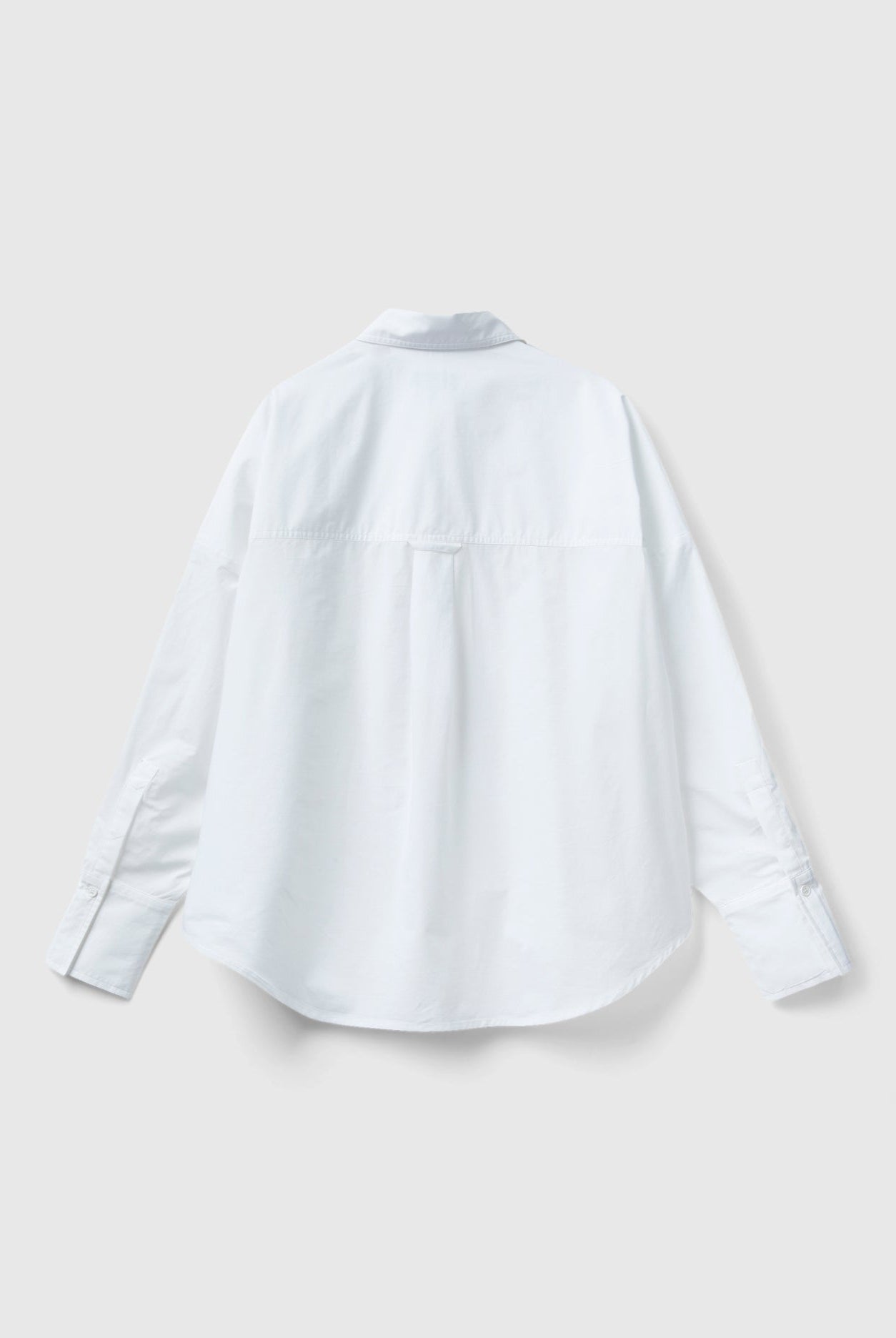 يونايتد كولورز اوف بينيتون قميص قطني كبير بأكمام طويلة