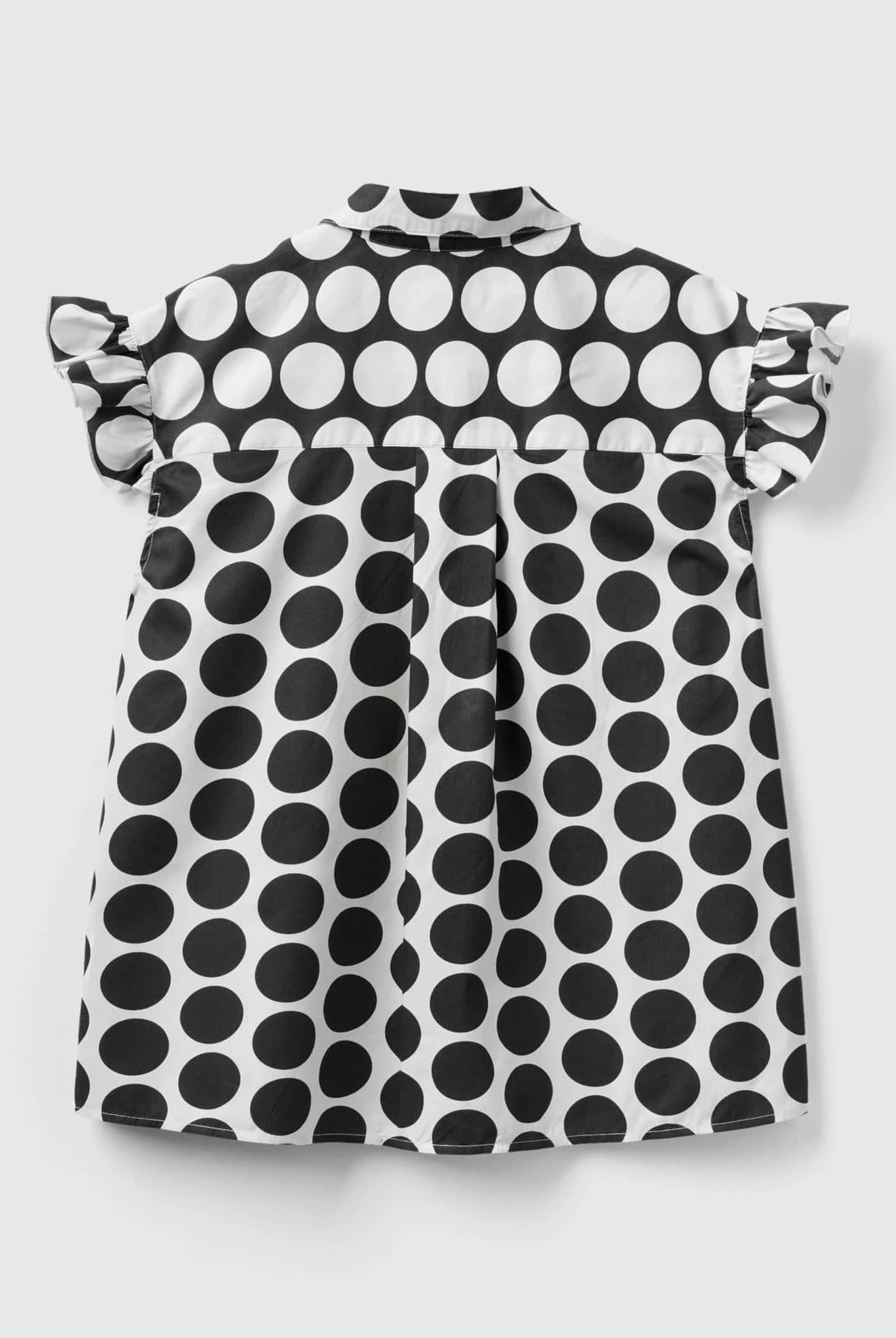 يونايتد كولورز اوف بينيتون قميص نسائي بدون أكمام منقط