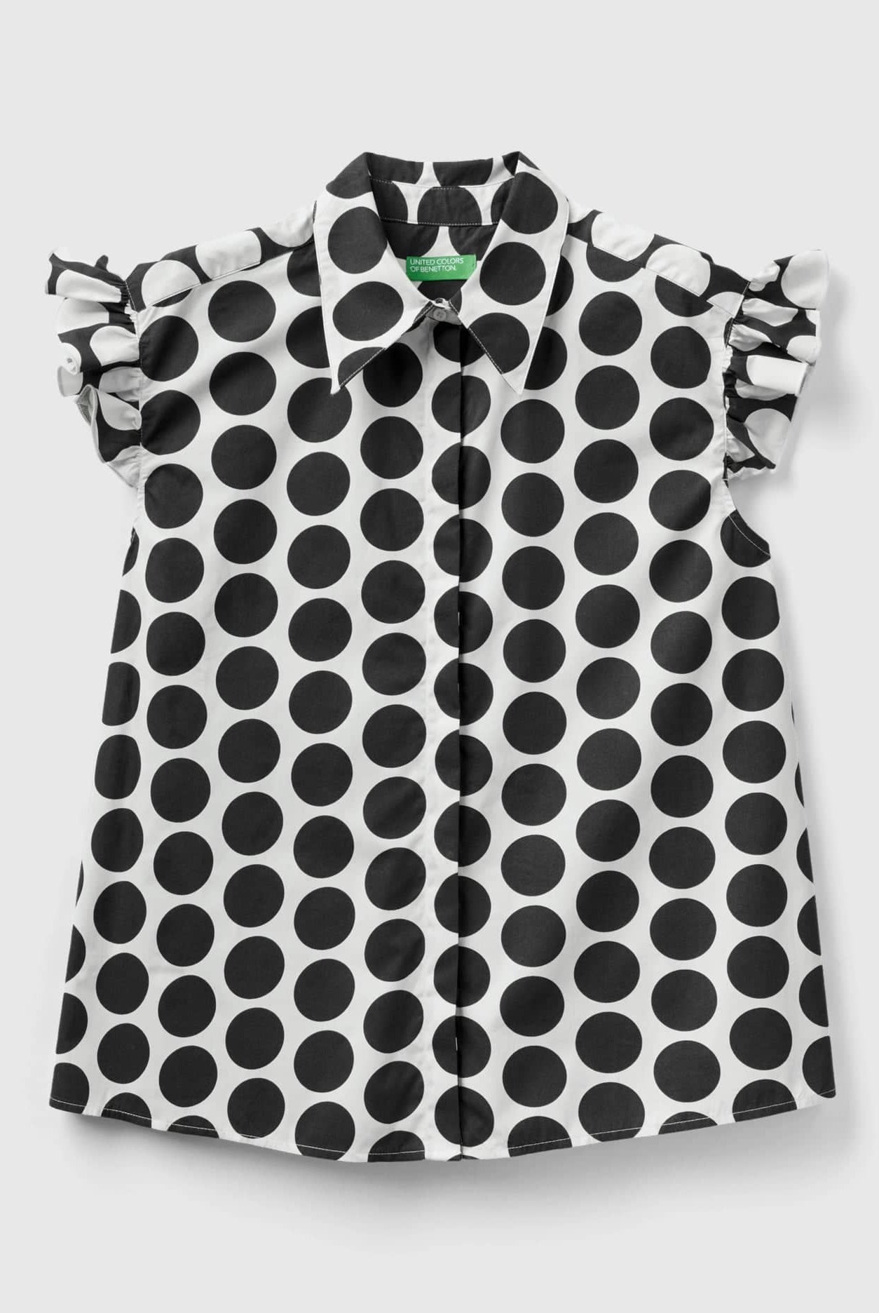 يونايتد كولورز اوف بينيتون قميص نسائي بدون أكمام منقط