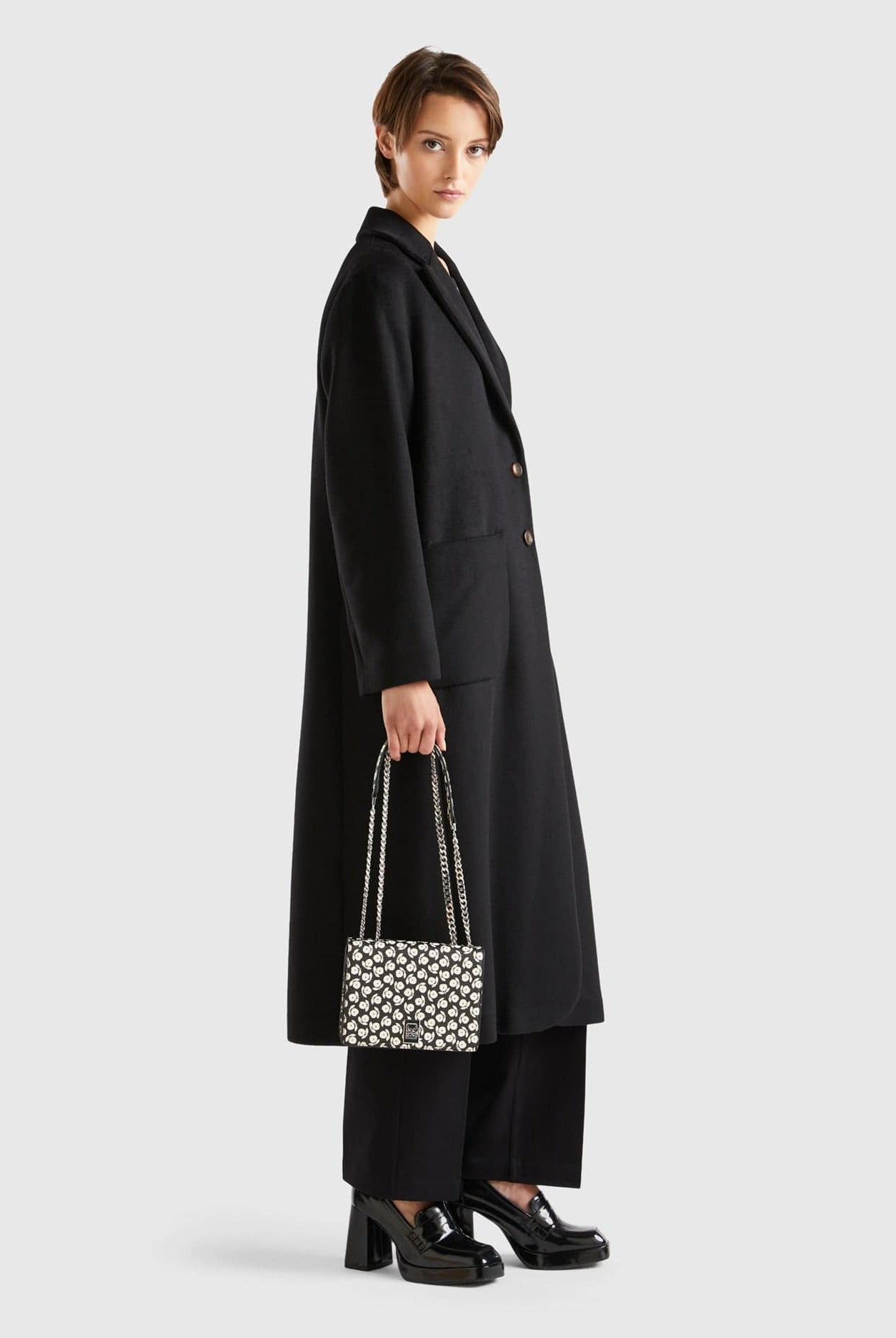 يونايتد كولورز اوف بينيتون حقيبة نسائي ذات نقش زهور من الجلد الصناعي