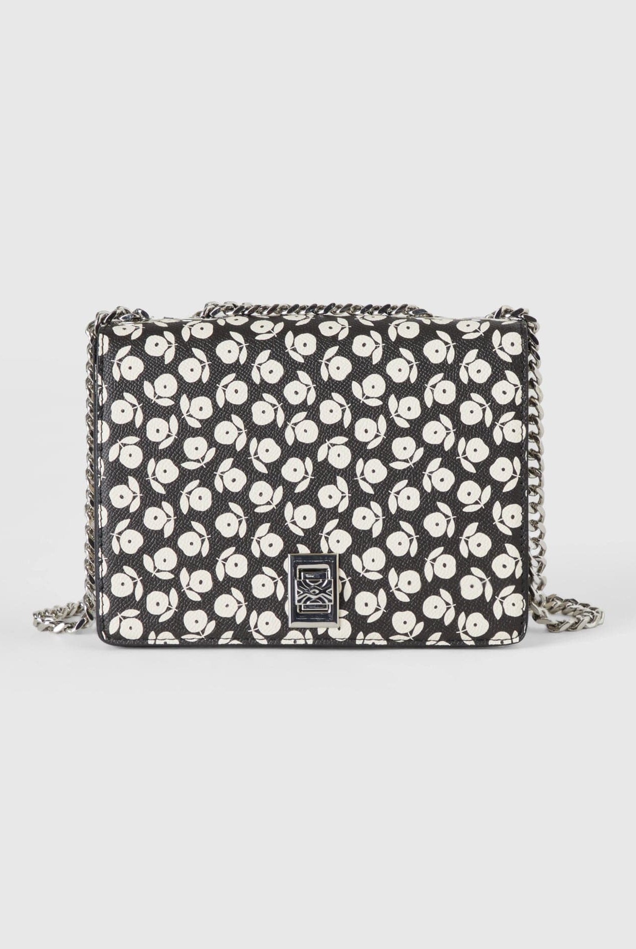 يونايتد كولورز اوف بينيتون حقيبة نسائي ذات نقش زهور من الجلد الصناعي