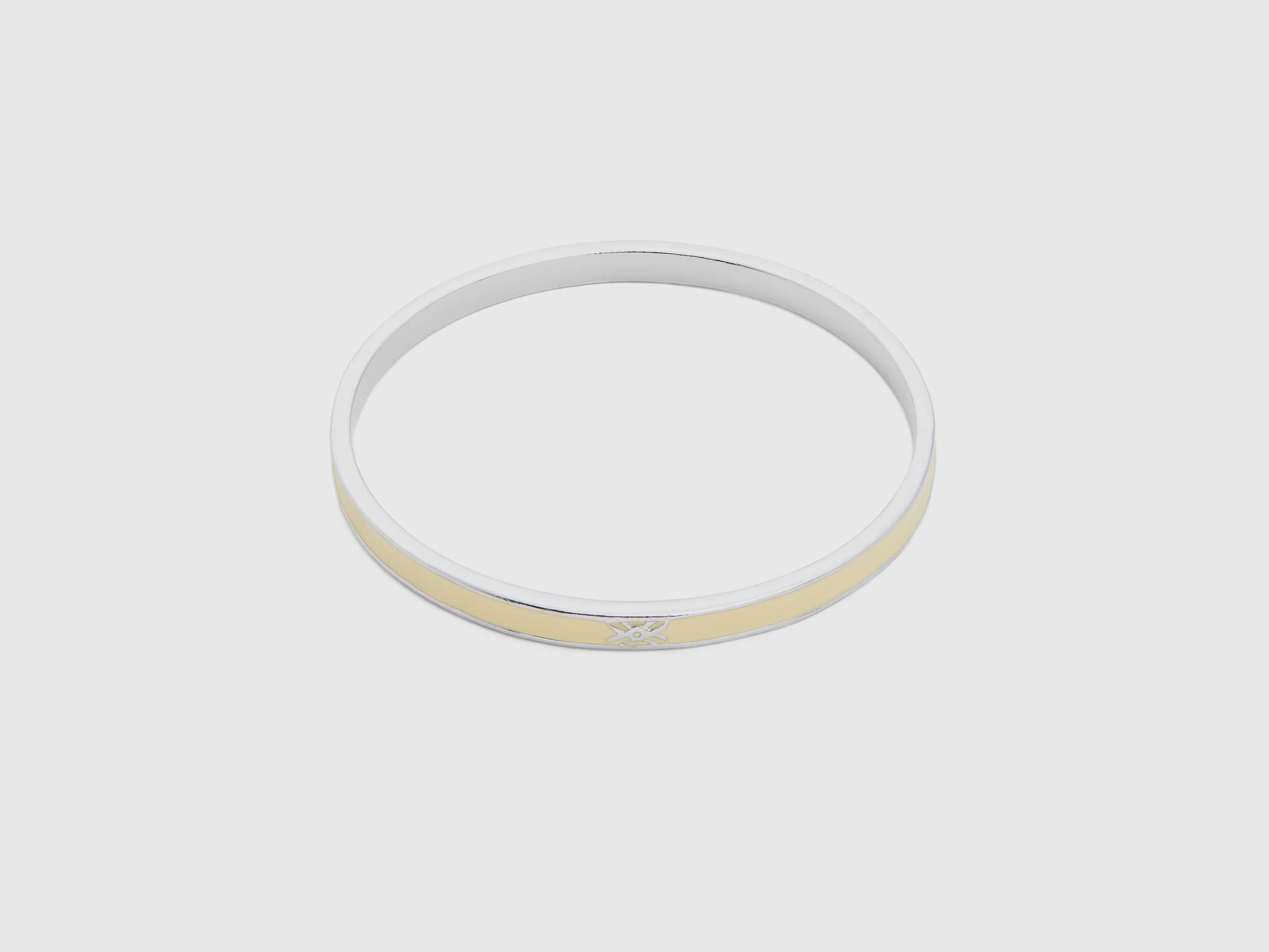 يونايتد كولورز اوف بينيتون سوار رفيع باللون الأصفر الفاتح