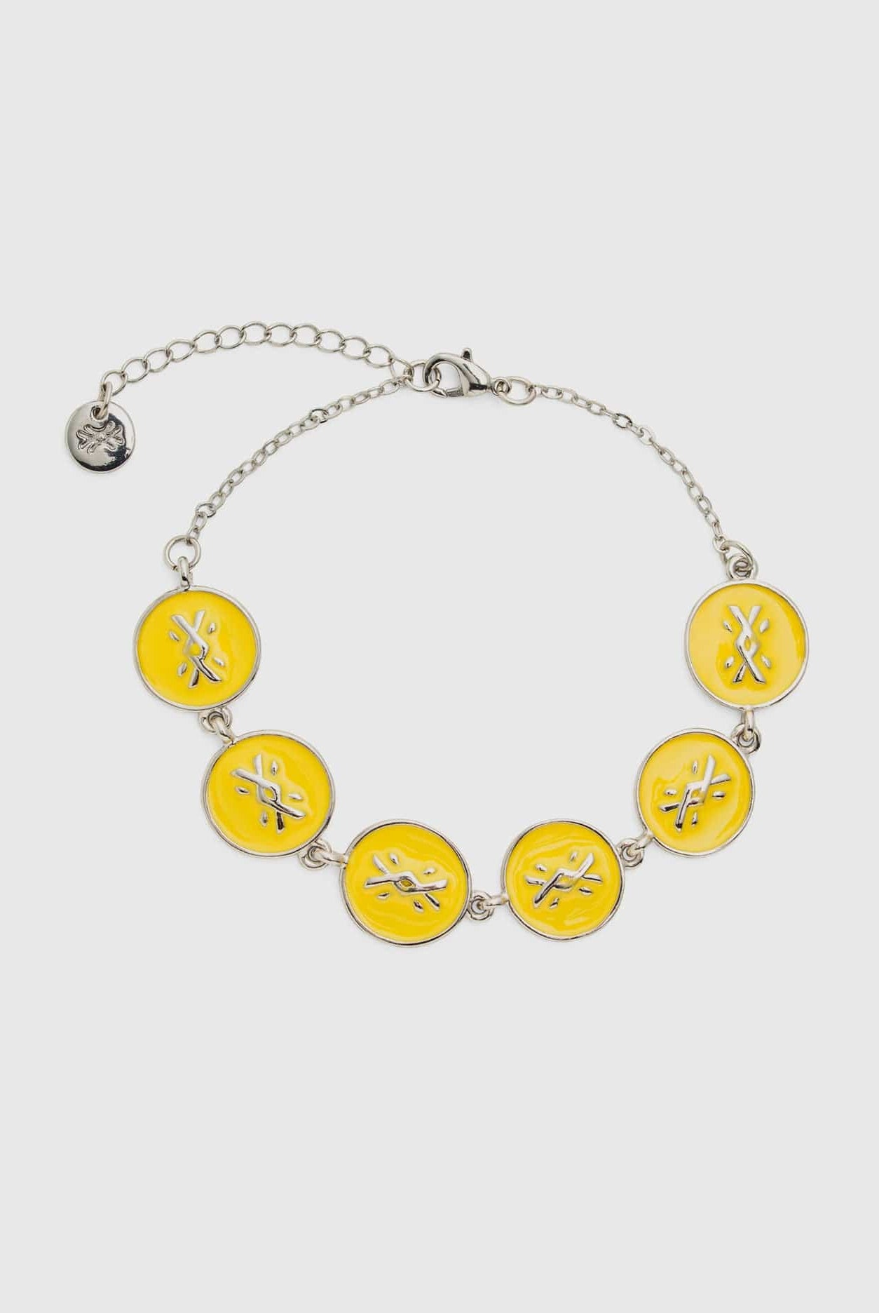 يونايتد كولورز اوف بينيتون سوار فضي مع قلاده خضراء