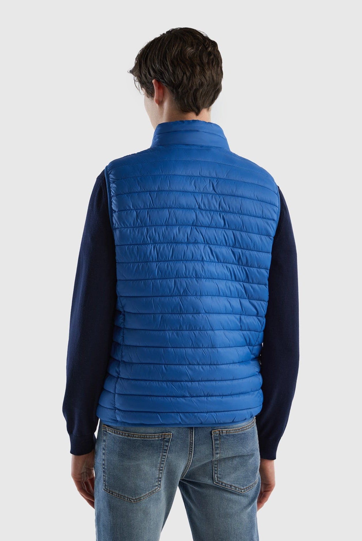 يونايتد كولورز اوف بينيتون جاكيت نفخ شبابي بدون أكمام مبطن