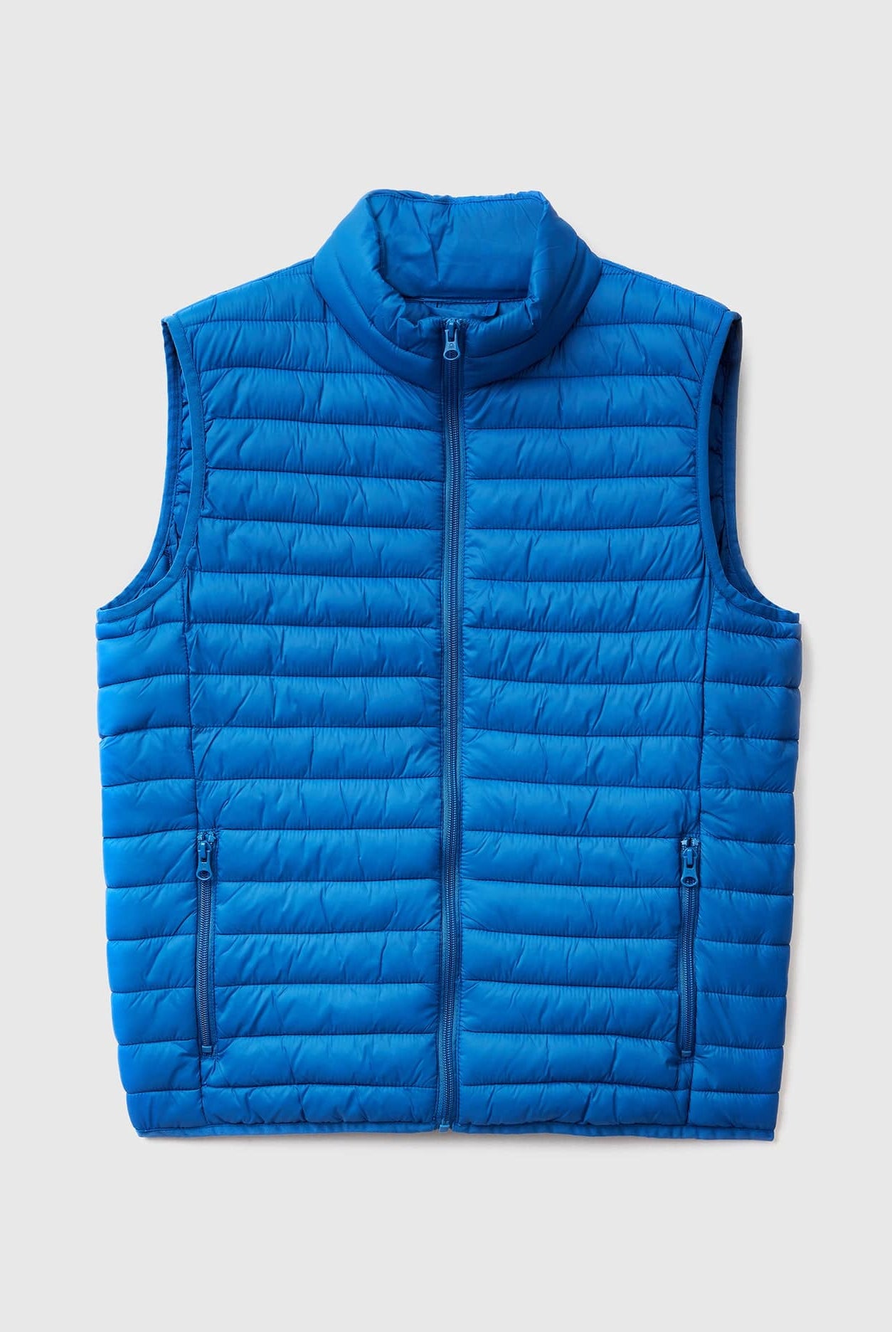 يونايتد كولورز اوف بينيتون جاكيت نفخ شبابي بدون أكمام مبطن