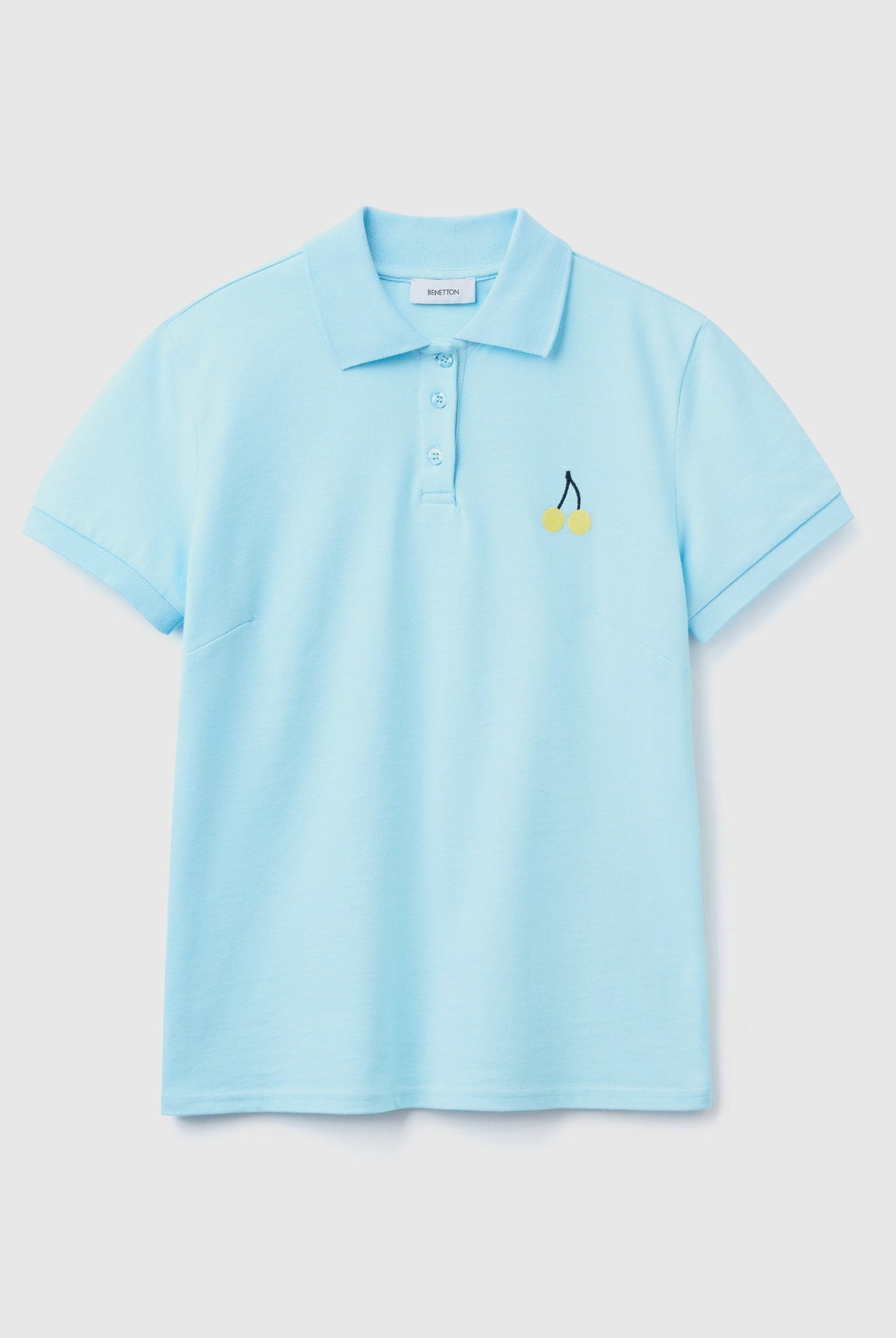 يونايتد كولورز اوف بينيتون تيشيرت بولو نسائي بتطريز فواكه