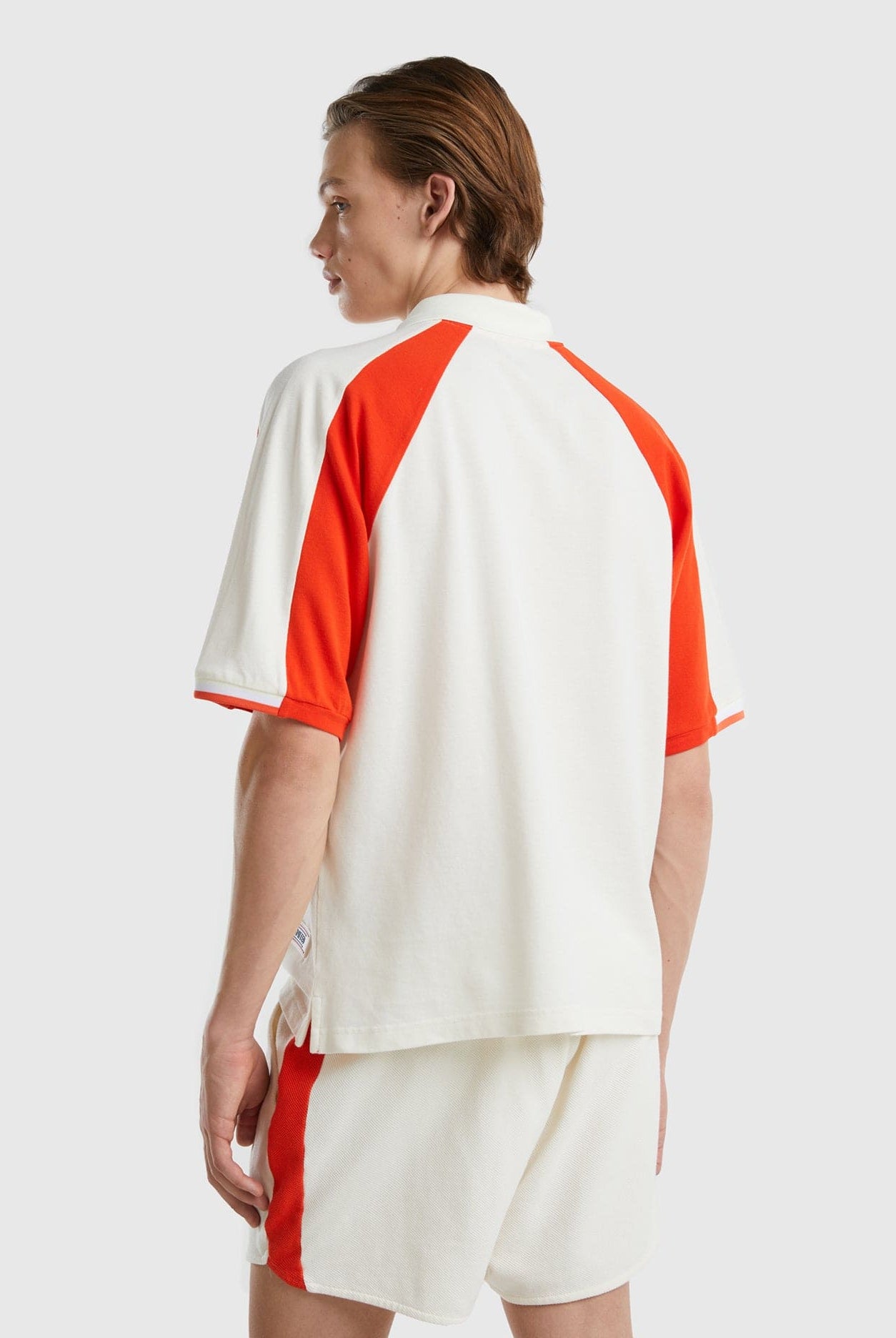 يونايتد كولورز اوف بينيتون تيشيرت بولو شبابي بأشرطة