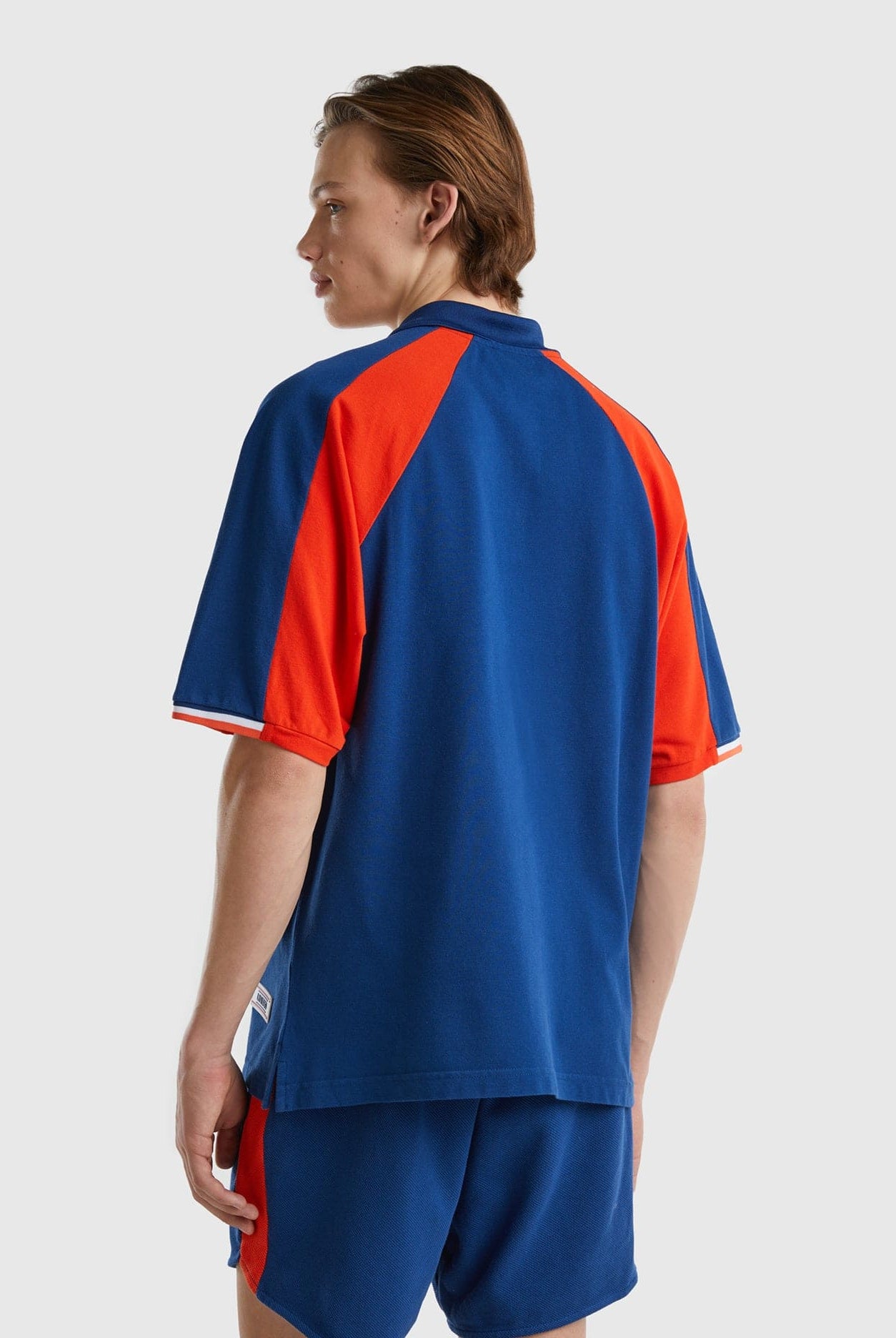 يونايتد كولورز اوف بينيتون تيشيرت بولو شبابي بأشرطة