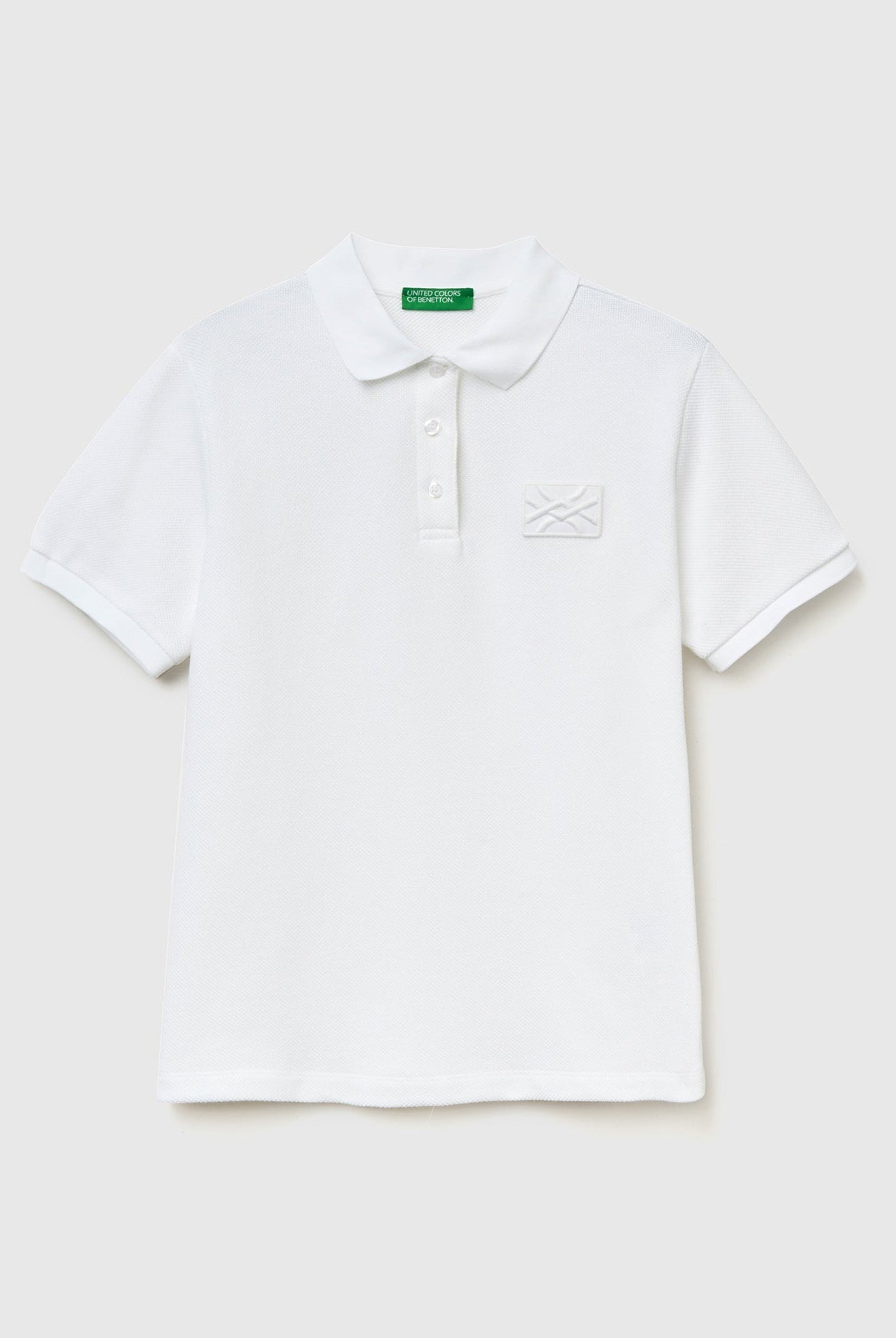 يونايتد كولورز اوف بينيتون تيشيرت بولو نسائي بأكمام قصيرة مع رقعة شعار