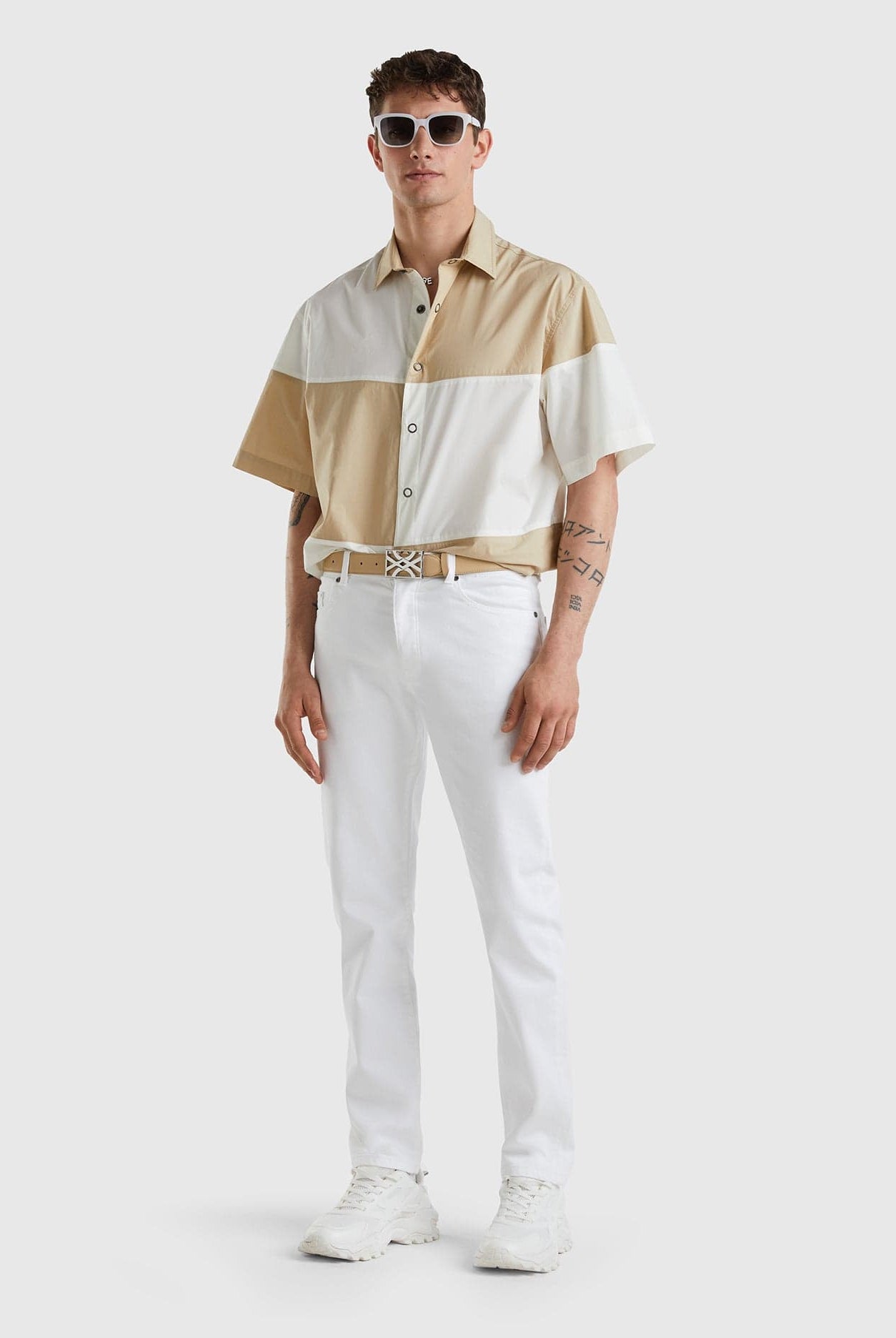 يونايتد كولورز اوف بينيتون بنطال جينز بقصة ضيقة وخفيف الوزن