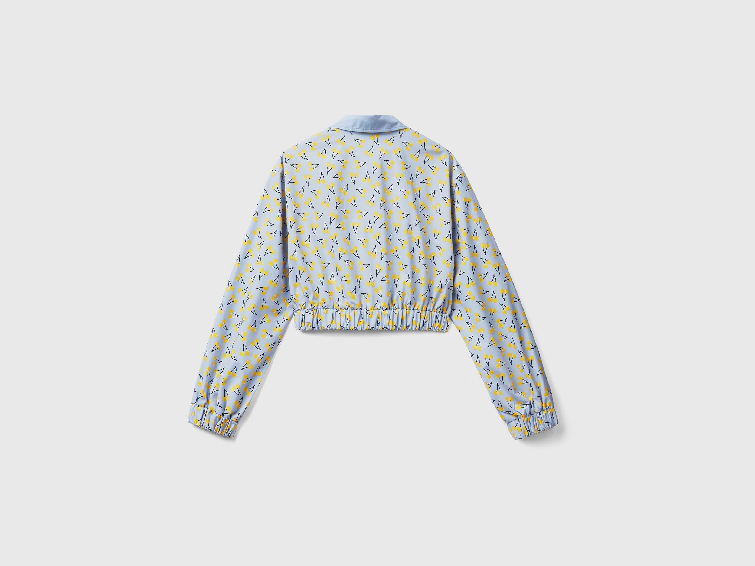 يونايتد كولورز اوف بينيتون قميص قصير بنمط الفاكهة بخصر مرتفع نسائي