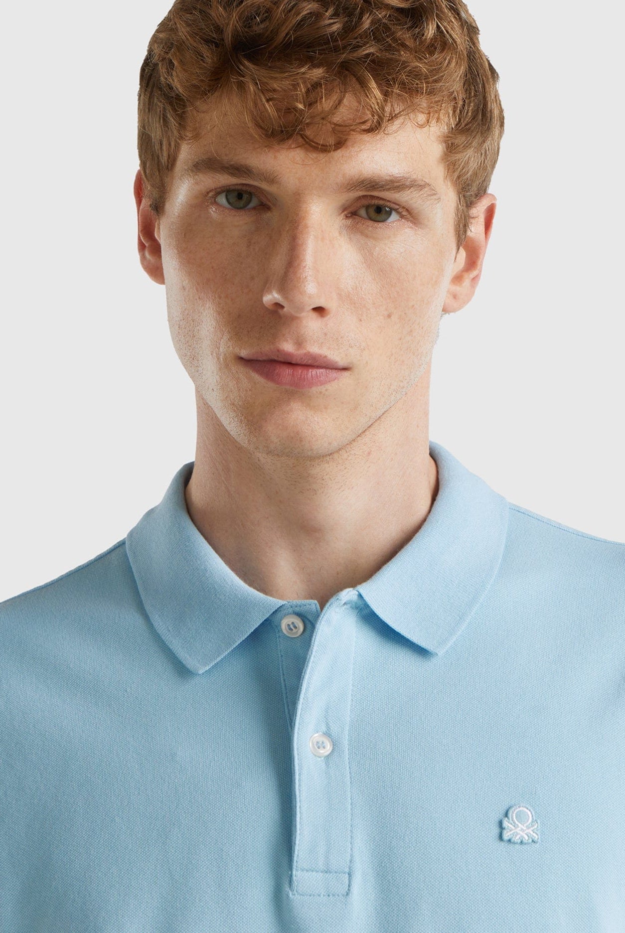 يونايتد كولورز اوف بينيتون تيشرت بولو رجالي سادة كم قصير