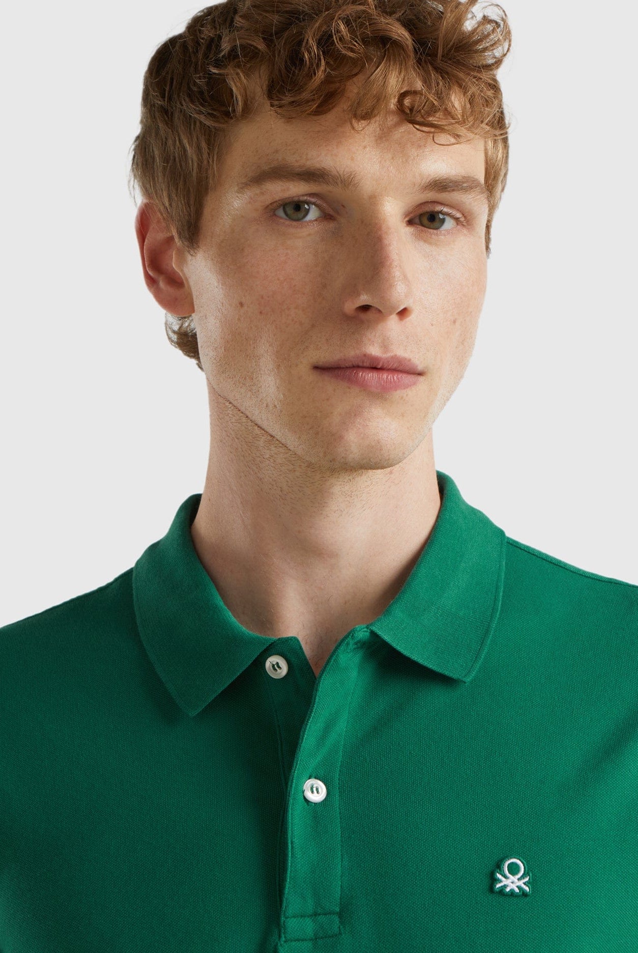 يونايتد كولورز اوف بينيتون تيشرت بولو رجالي سادة كم قصير