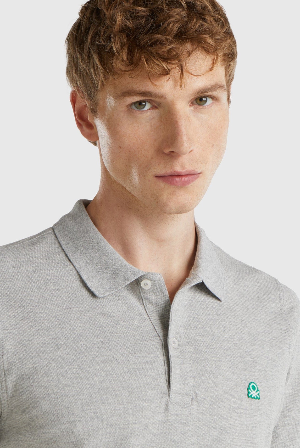 يونايتد كولورز اوف بينيتون تيشرت بولو رجالي سادة كم قصير