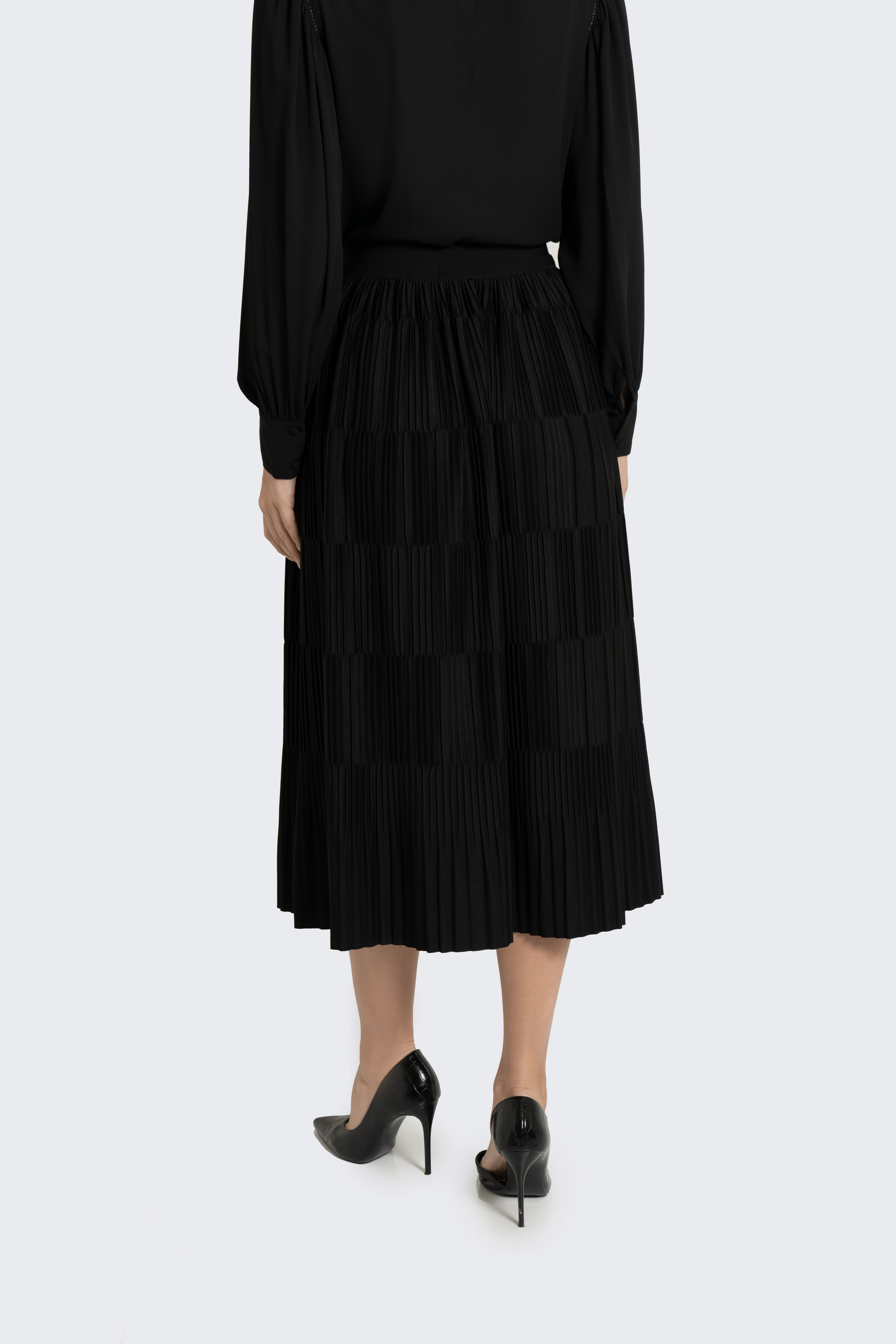 Fashion تنورة ميدي بليسية سادة مطاطة