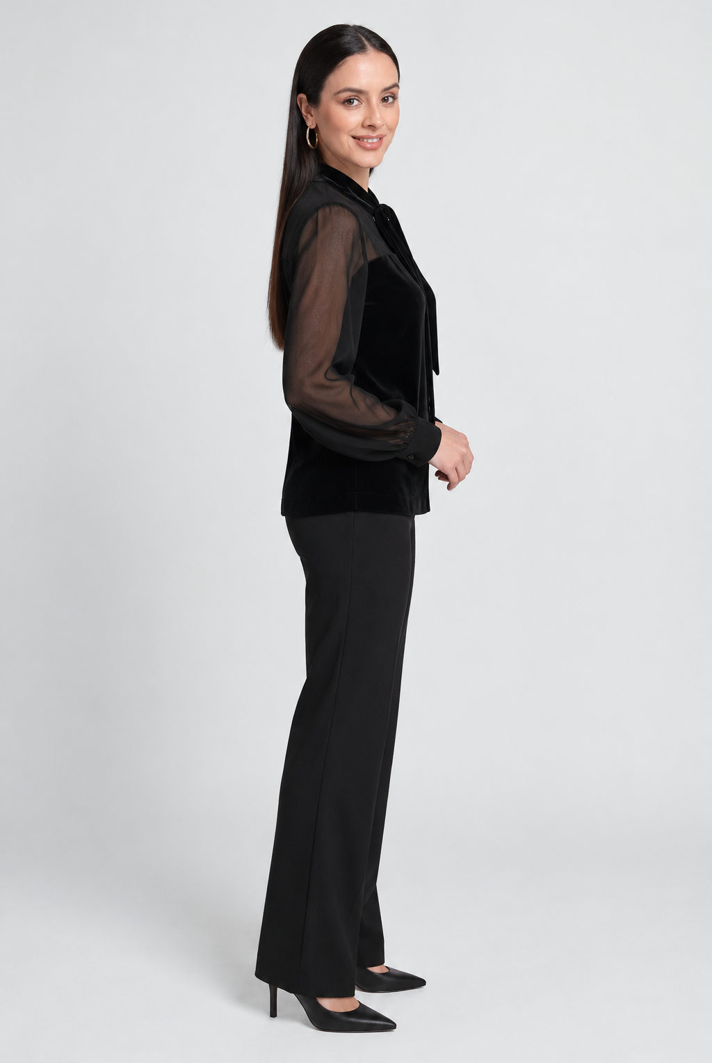 Black long-sleeve top — side view