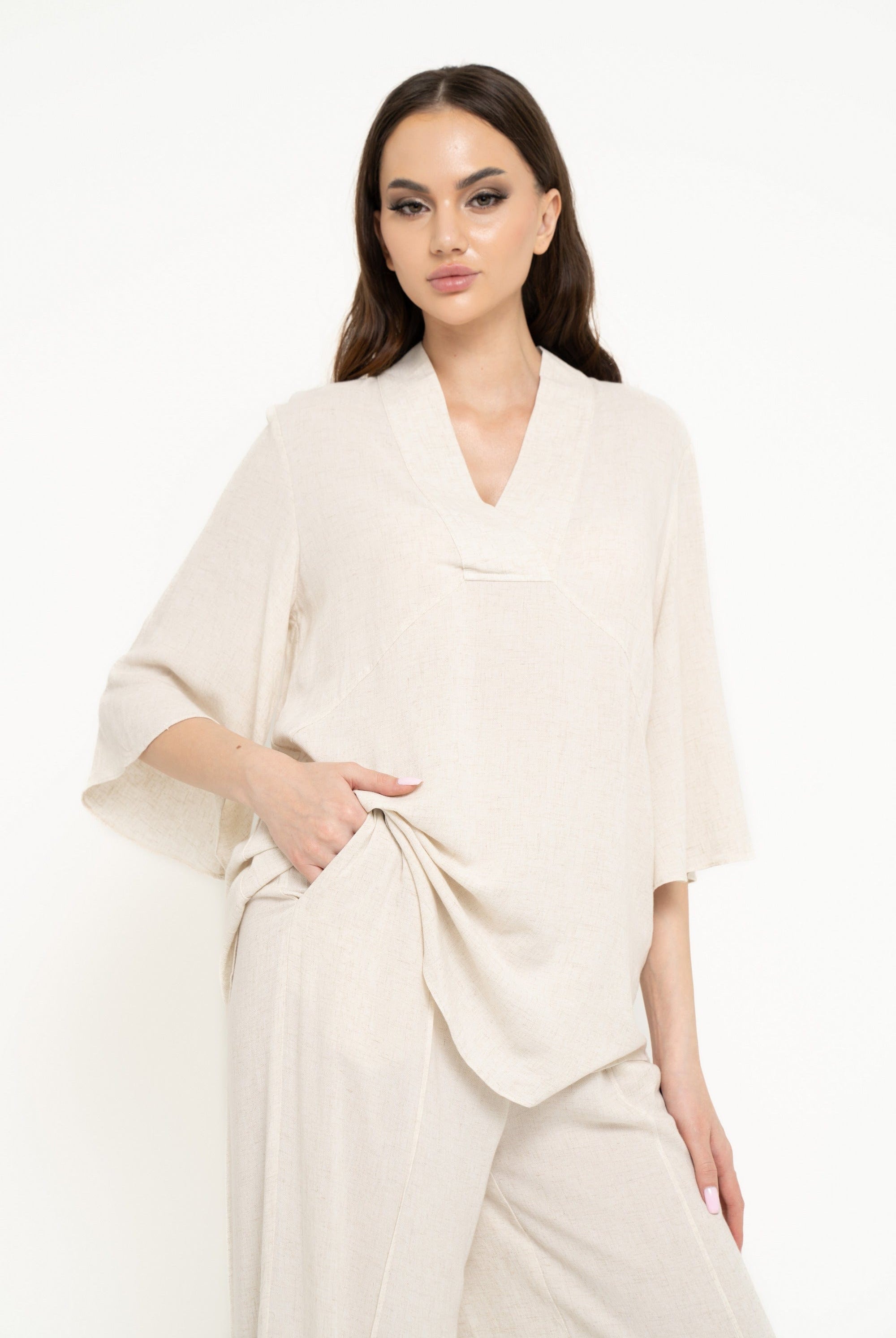 نتشي بلوزة سادة واسعة 3/4 كم نسائي