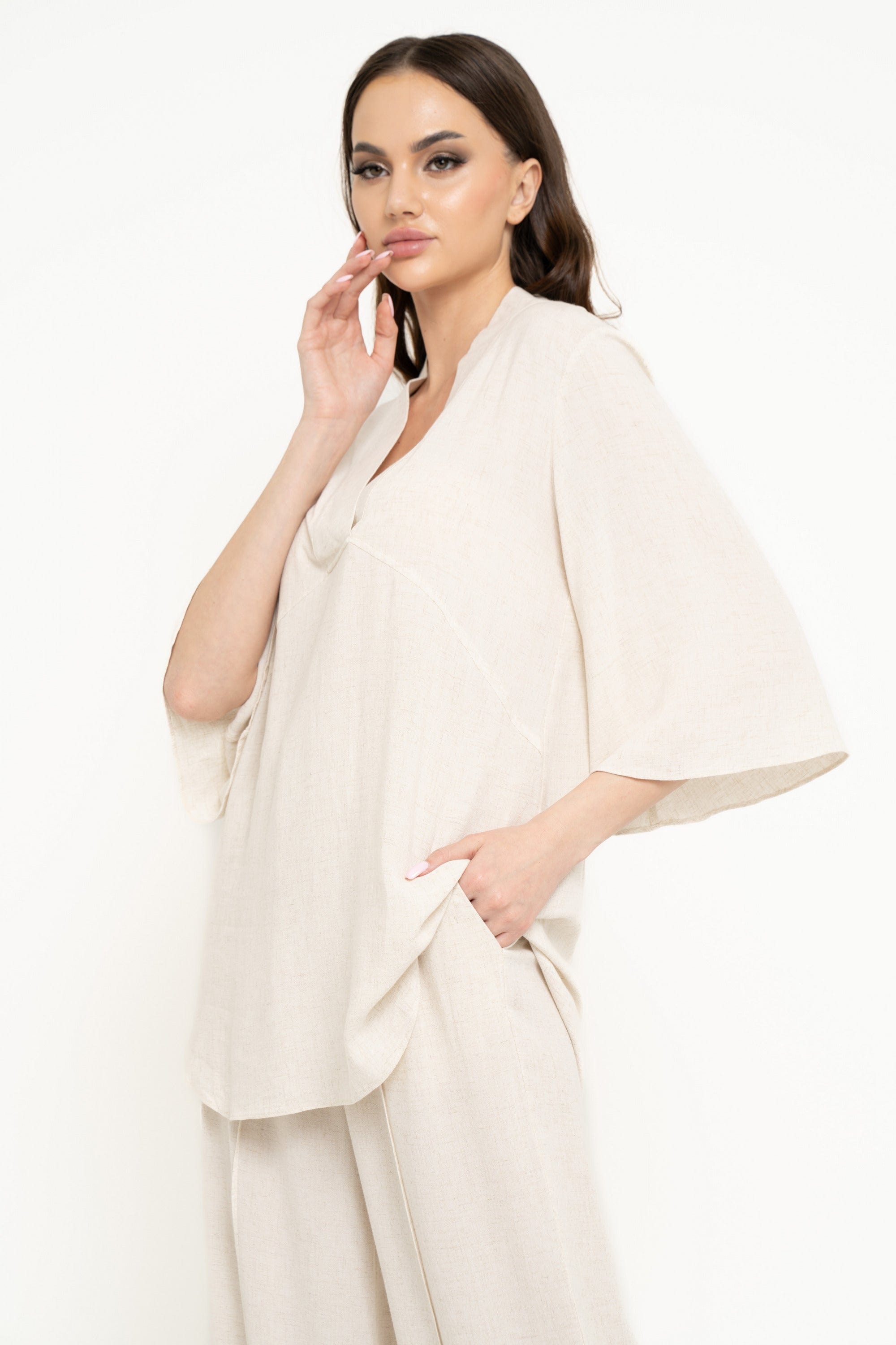 نتشي بلوزة سادة واسعة 3/4 كم نسائي