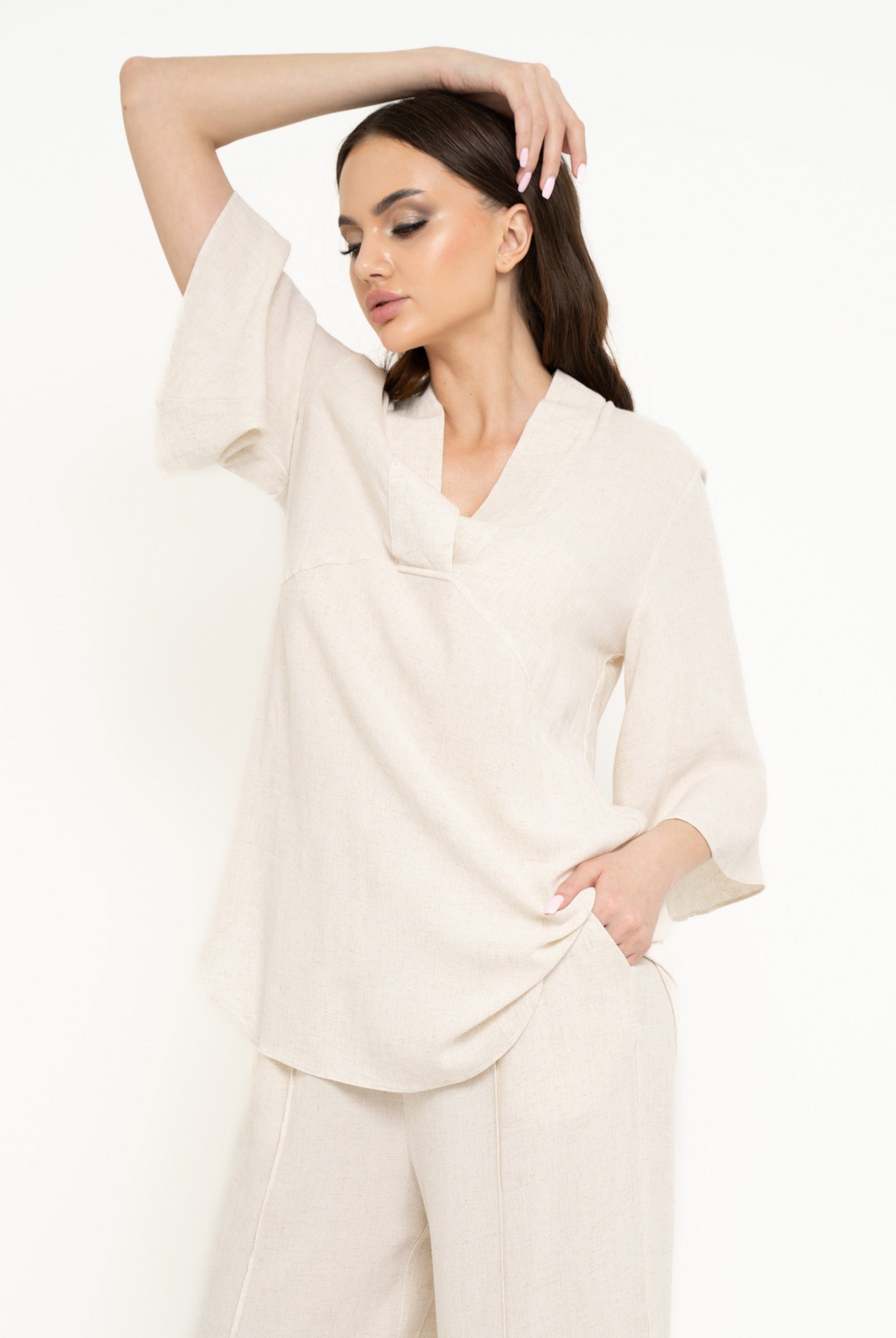 نتشي بلوزة سادة واسعة 3/4 كم نسائي