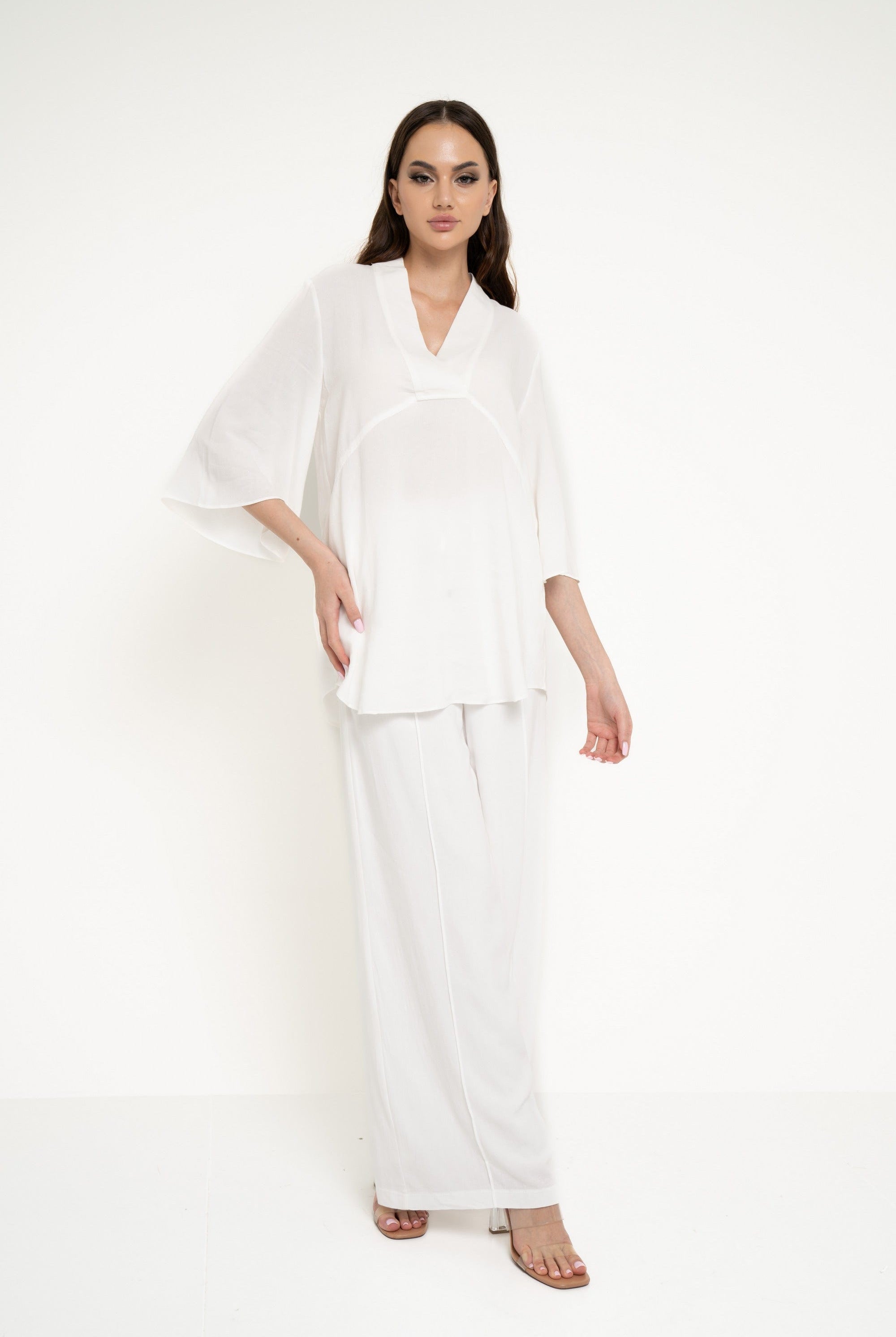 نتشي بلوزة سادة واسعة 3/4 كم نسائي