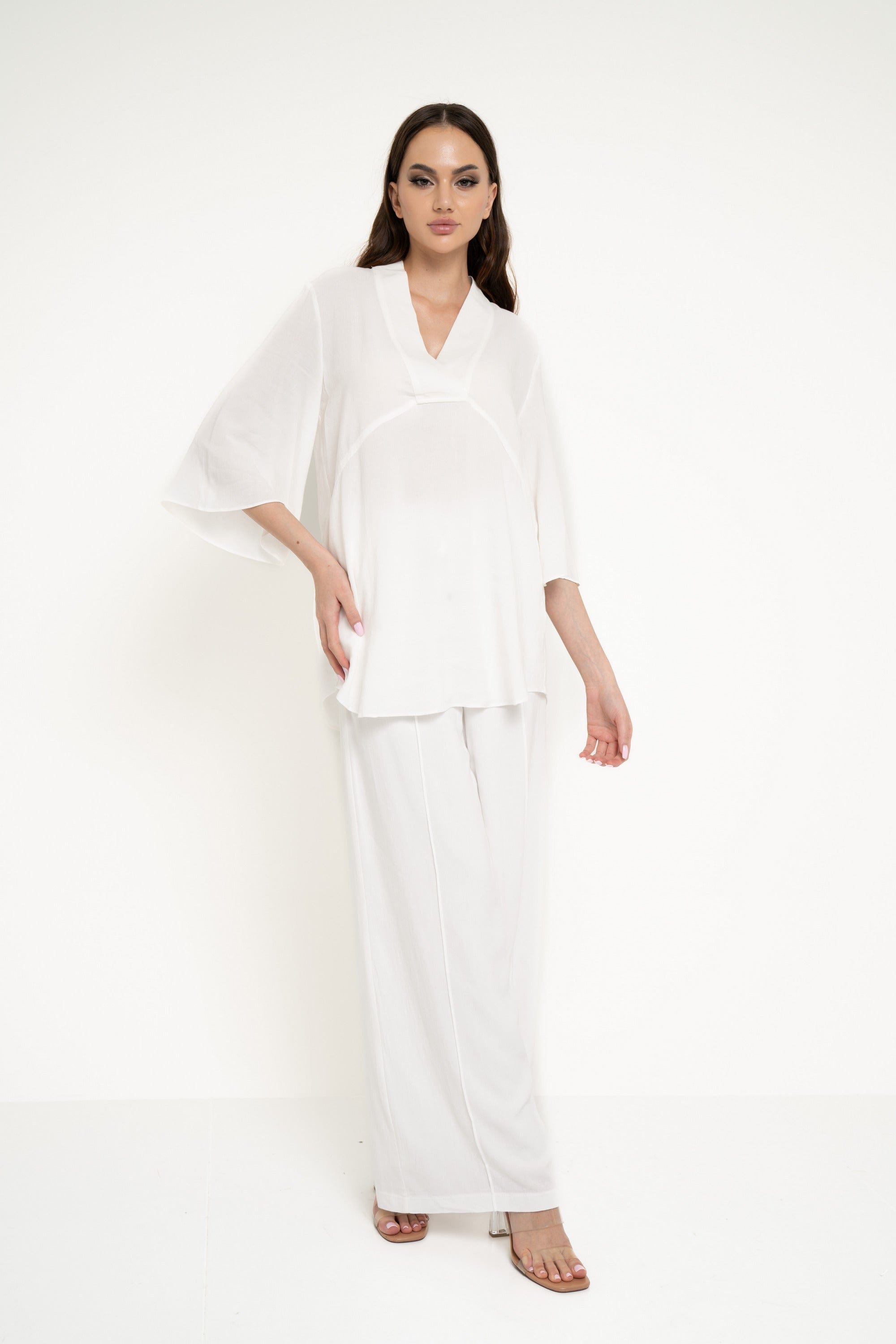 نتشي بلوزة سادة واسعة 3/4 كم نسائي