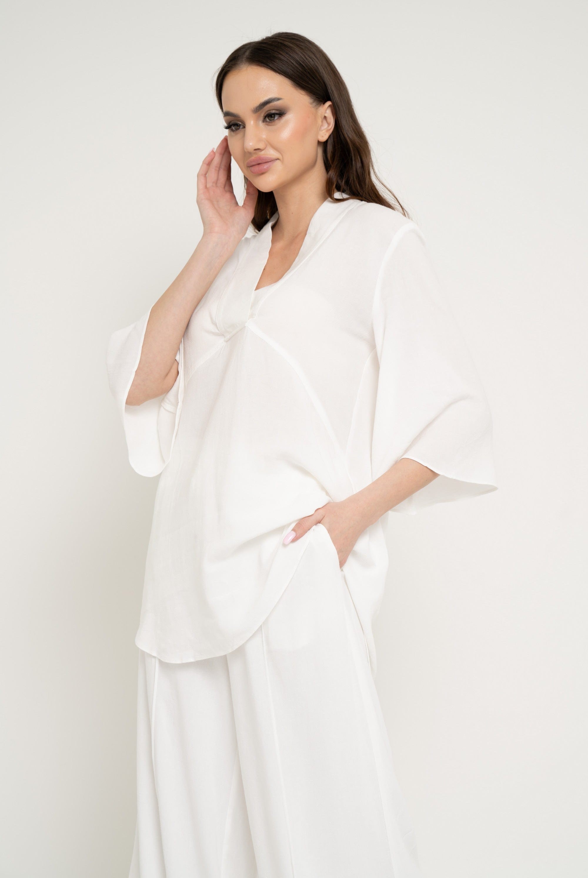 نتشي بلوزة سادة واسعة 3/4 كم نسائي