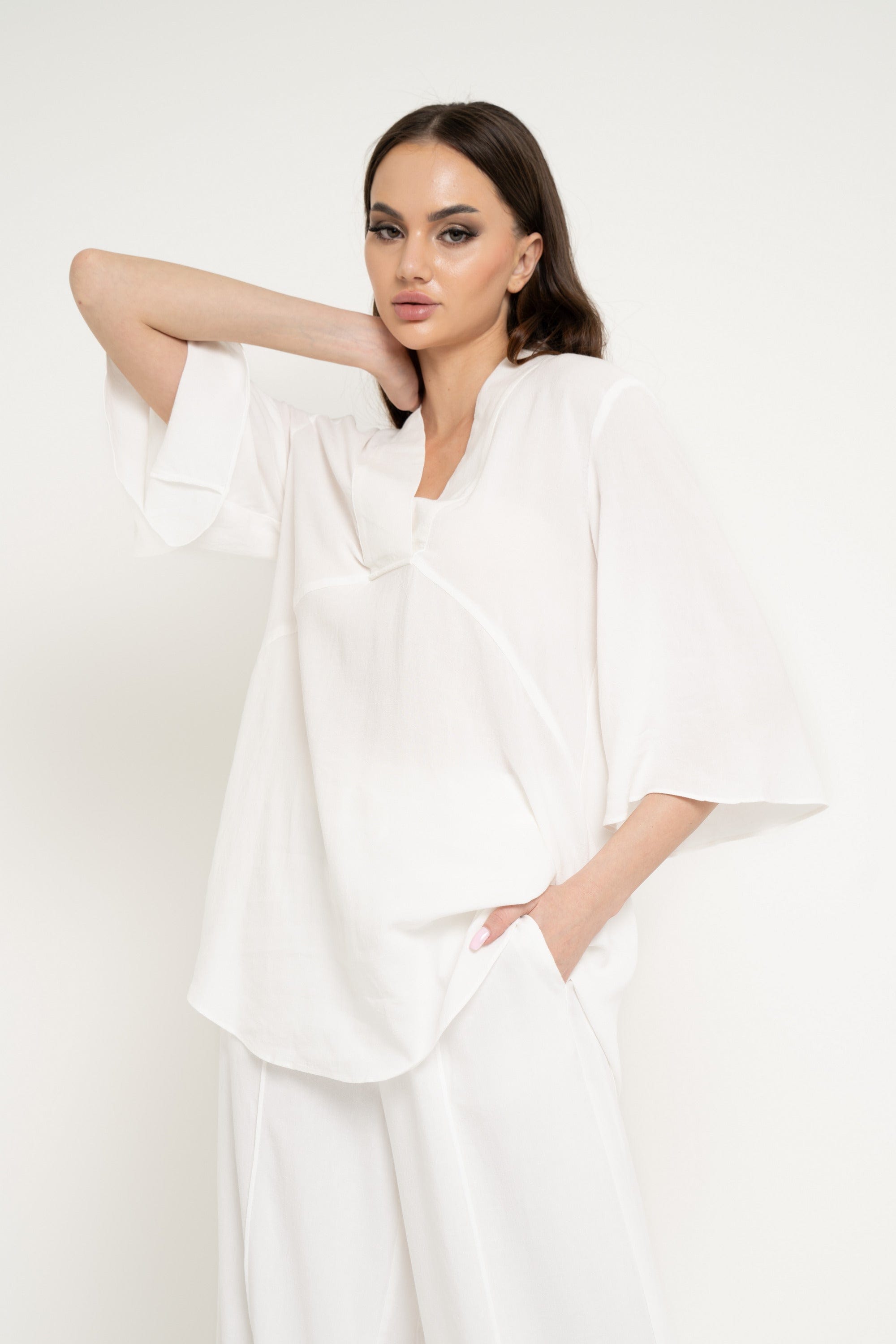 نتشي بلوزة سادة واسعة 3/4 كم نسائي