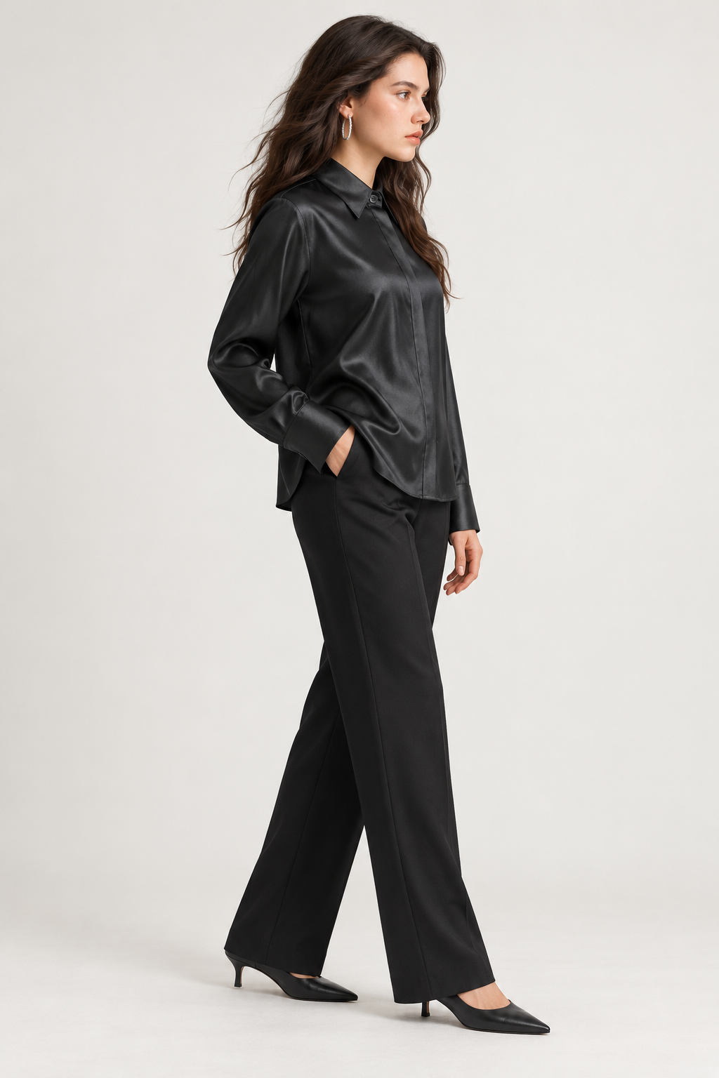 LV1012S263AN black satin blouse on model, side view