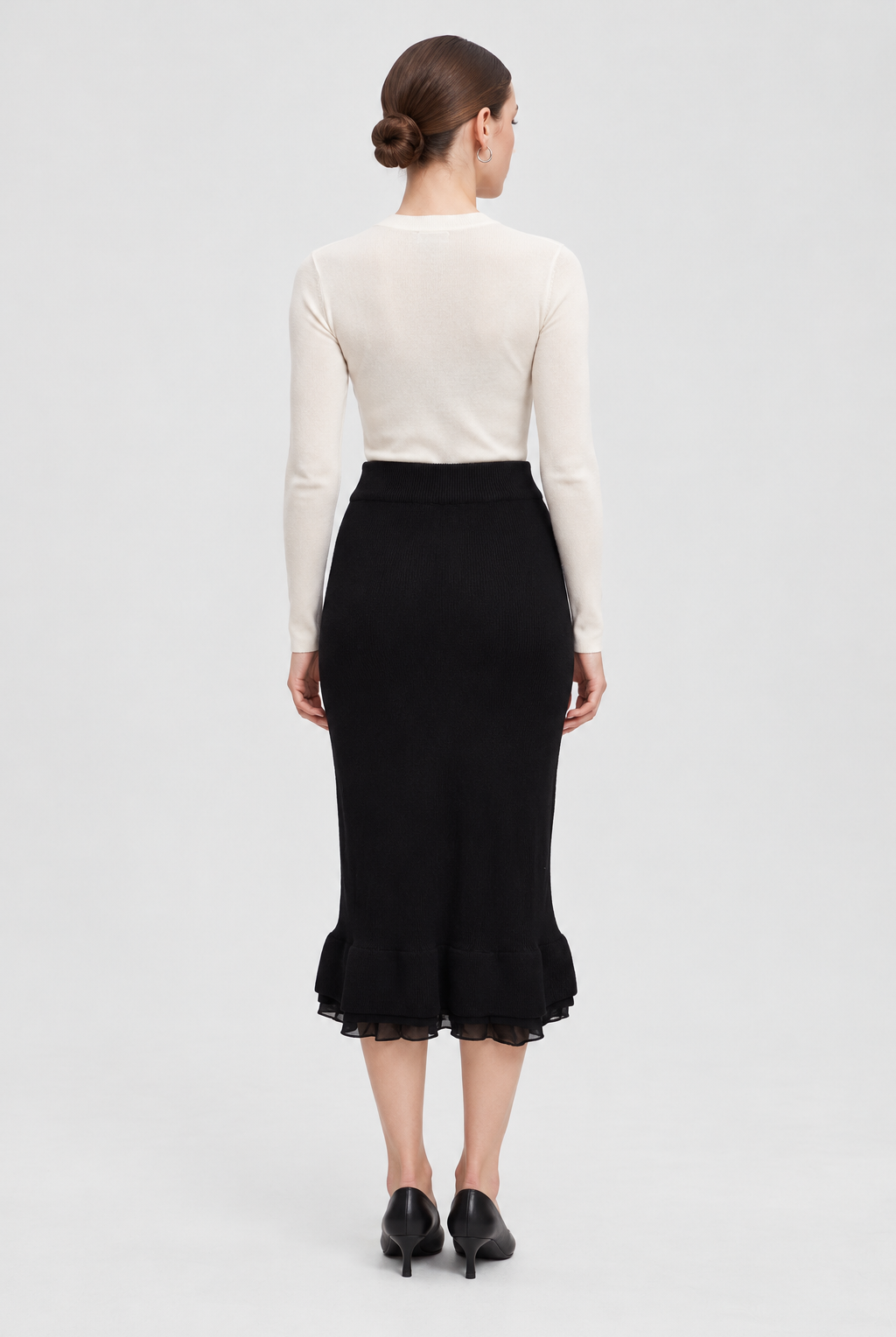 Black midi skirt — back view