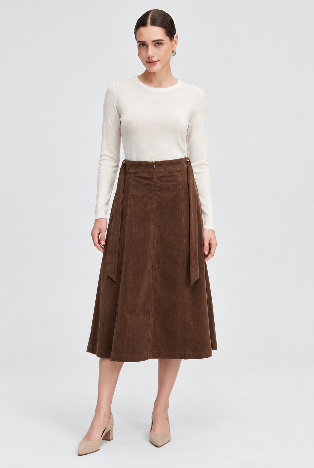 MA0873W264WN brown corduroy skirt on Hanna, full front