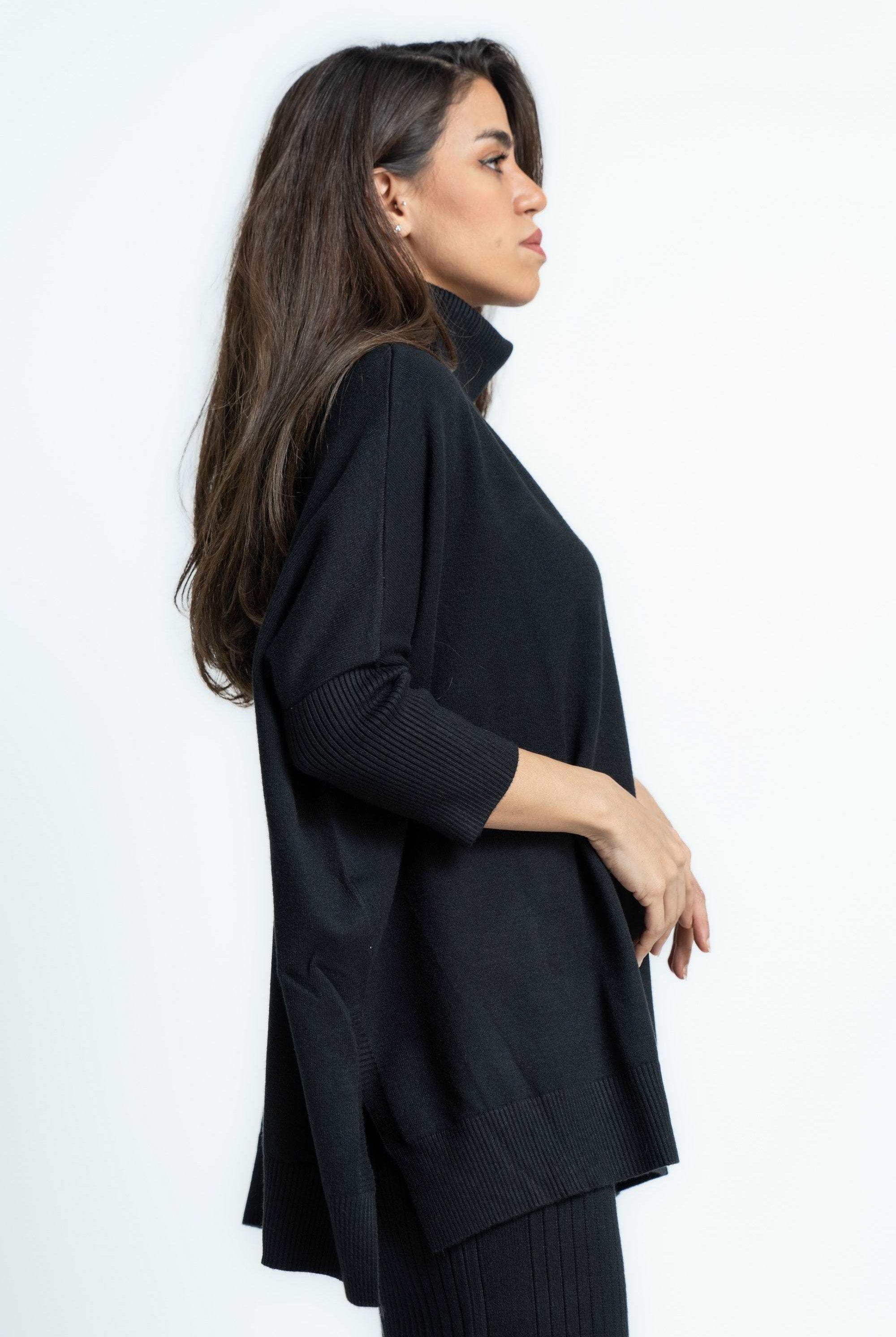 بلوفر نسائى برقبة عالية سادة كم طويل