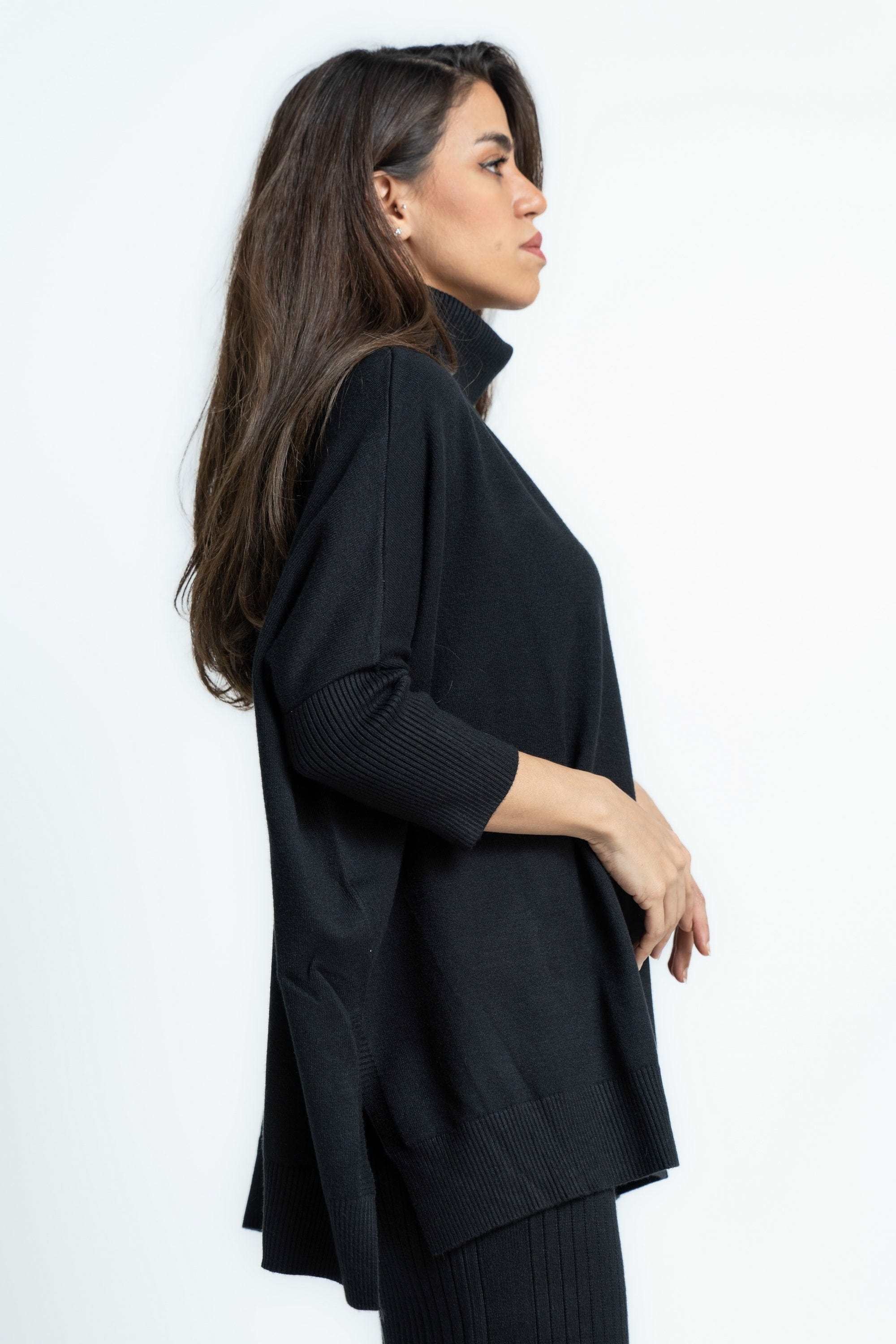 بلوفر نسائى برقبة عالية سادة كم طويل