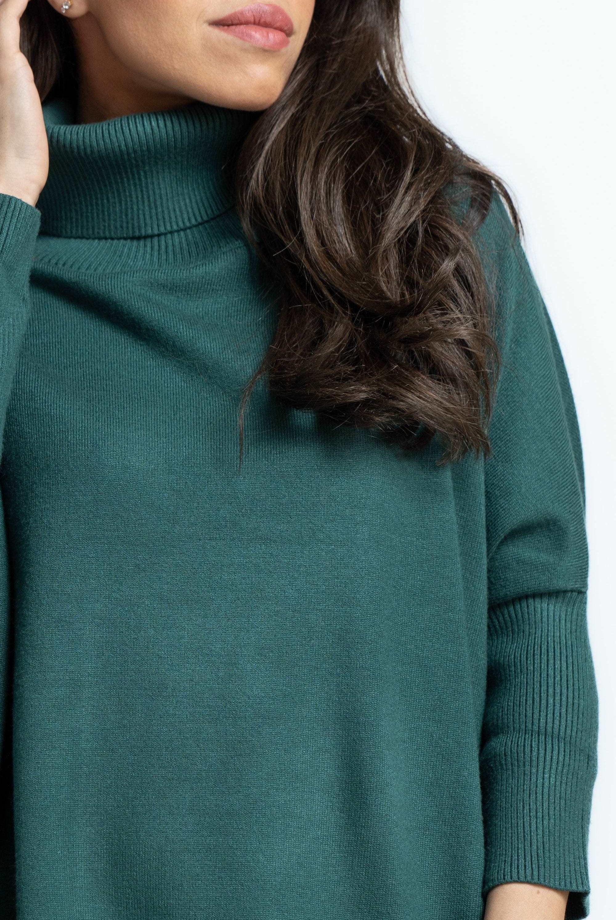 بلوفر نسائى برقبة عالية سادة كم طويل