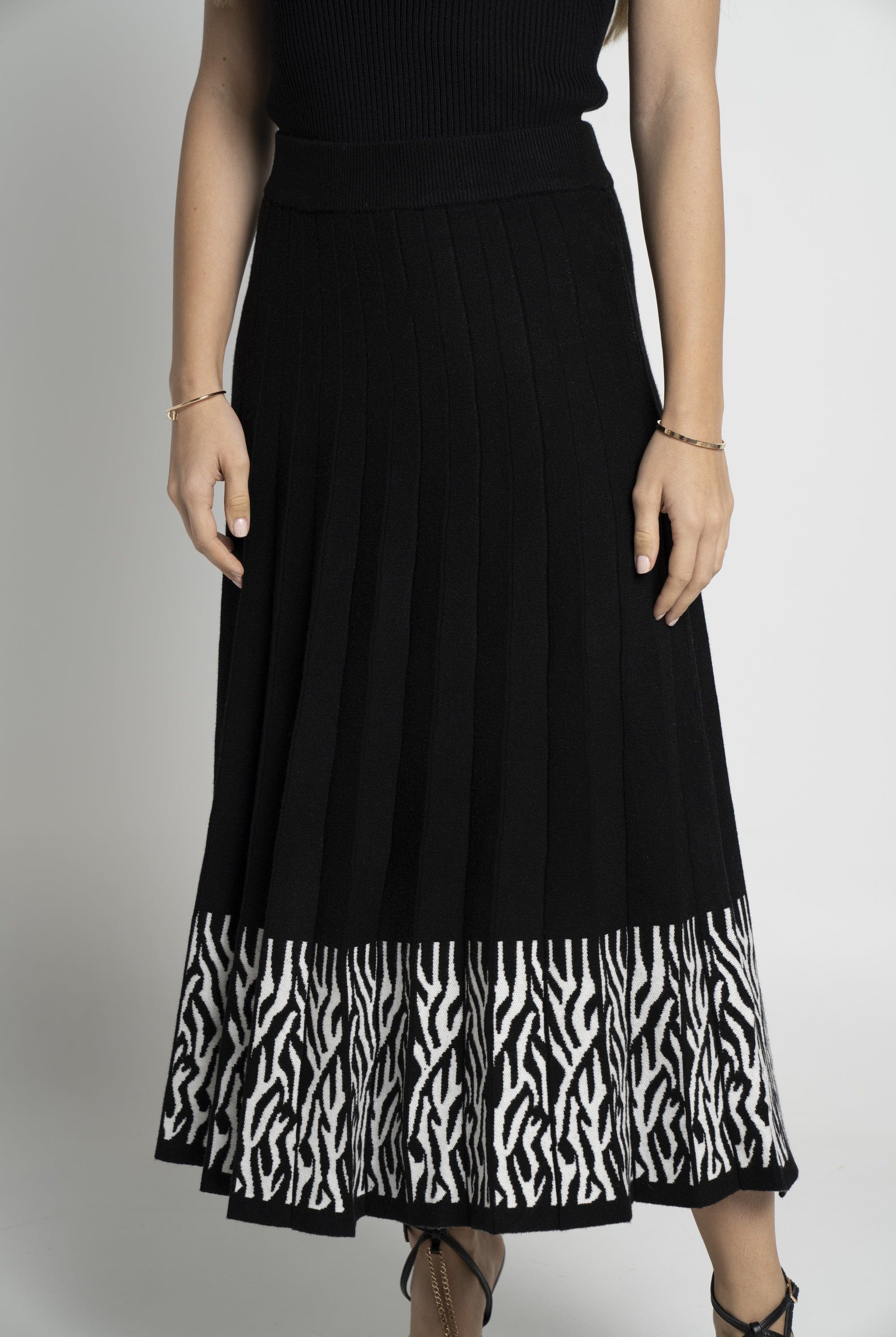 ميكا تنورة ميدي نسائي منقوشة من الذيل بطيات