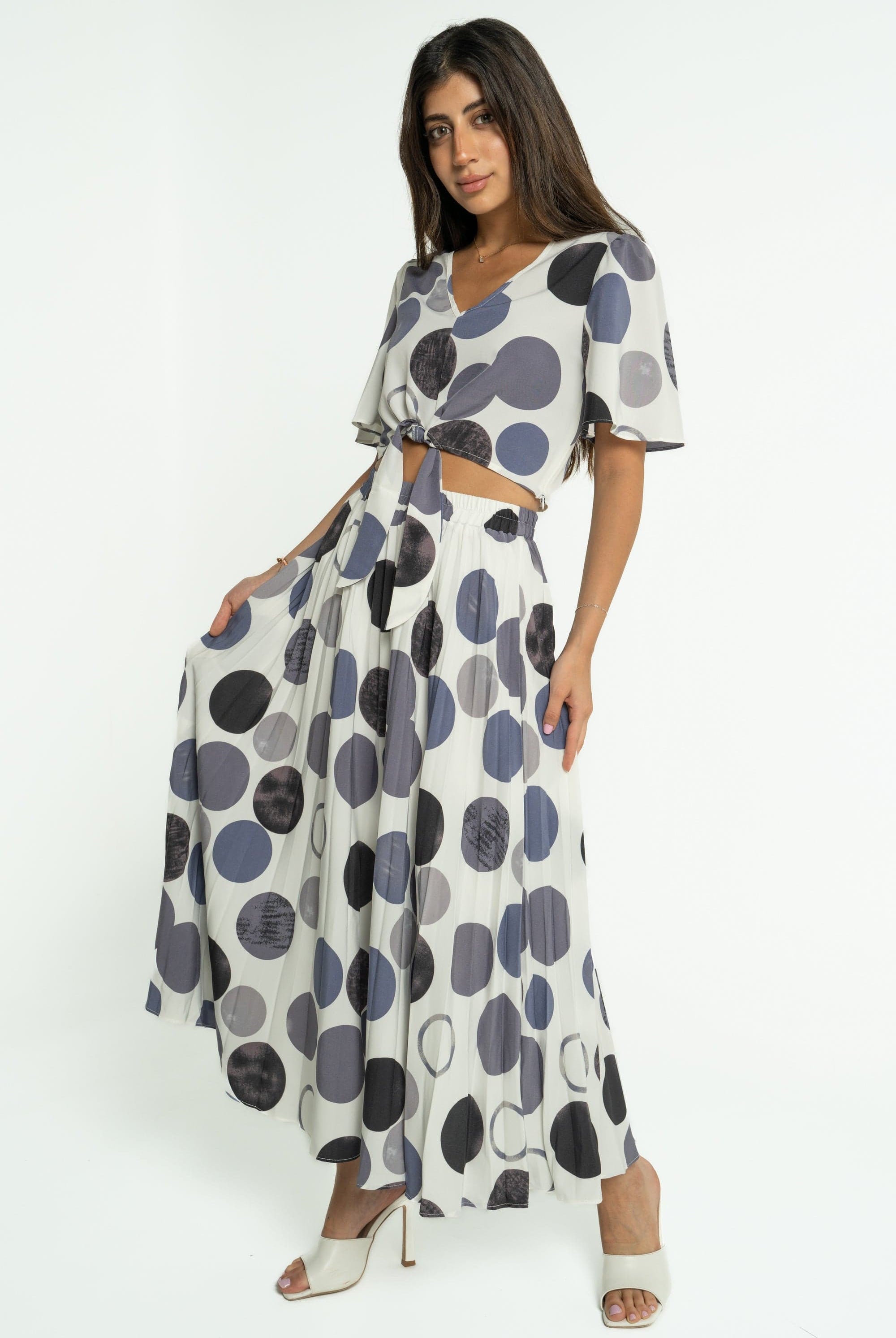 ميكا تنورة ميدي بليسية بنمط دوائر