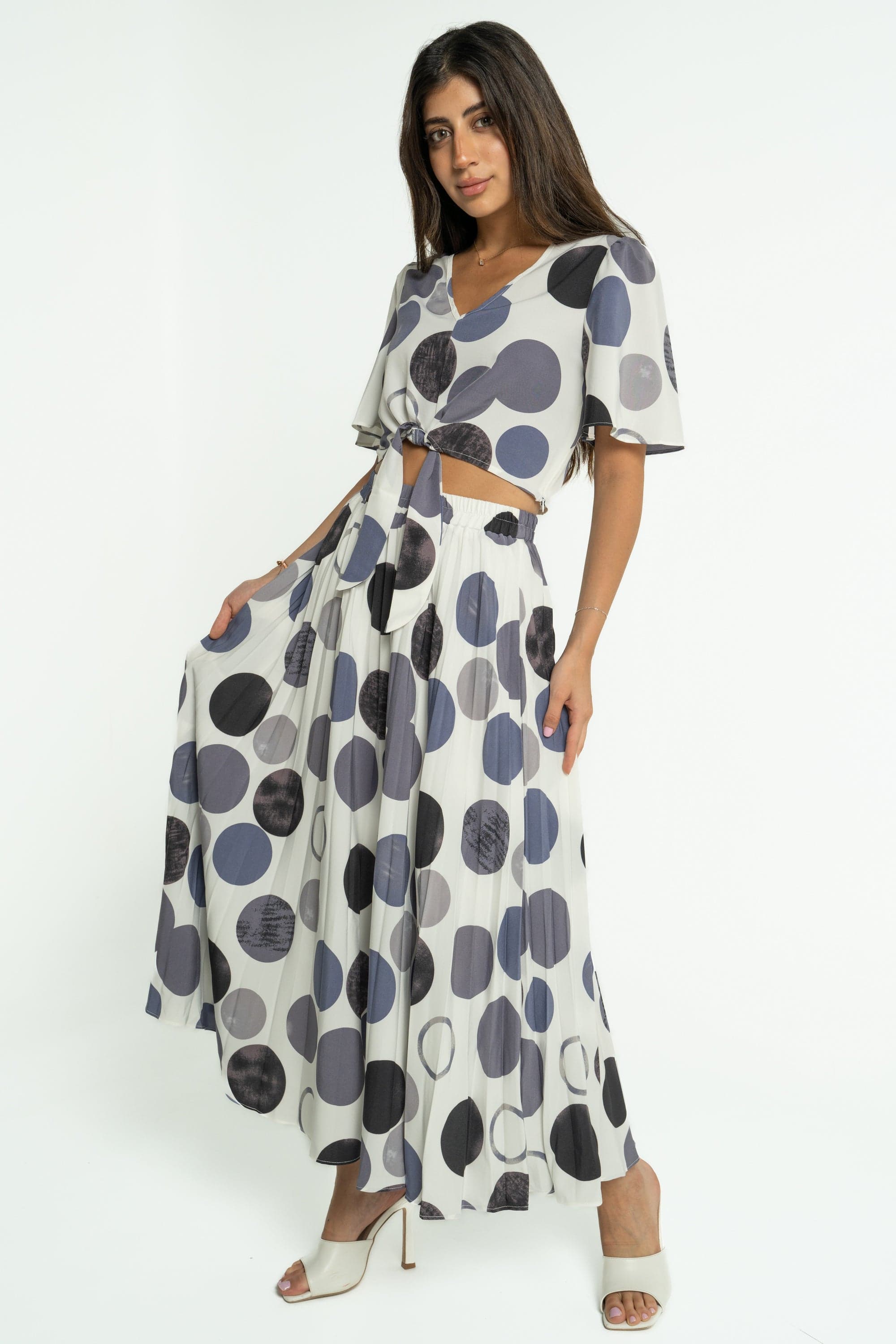 ميكا تنورة ميدي بليسية بنمط دوائر