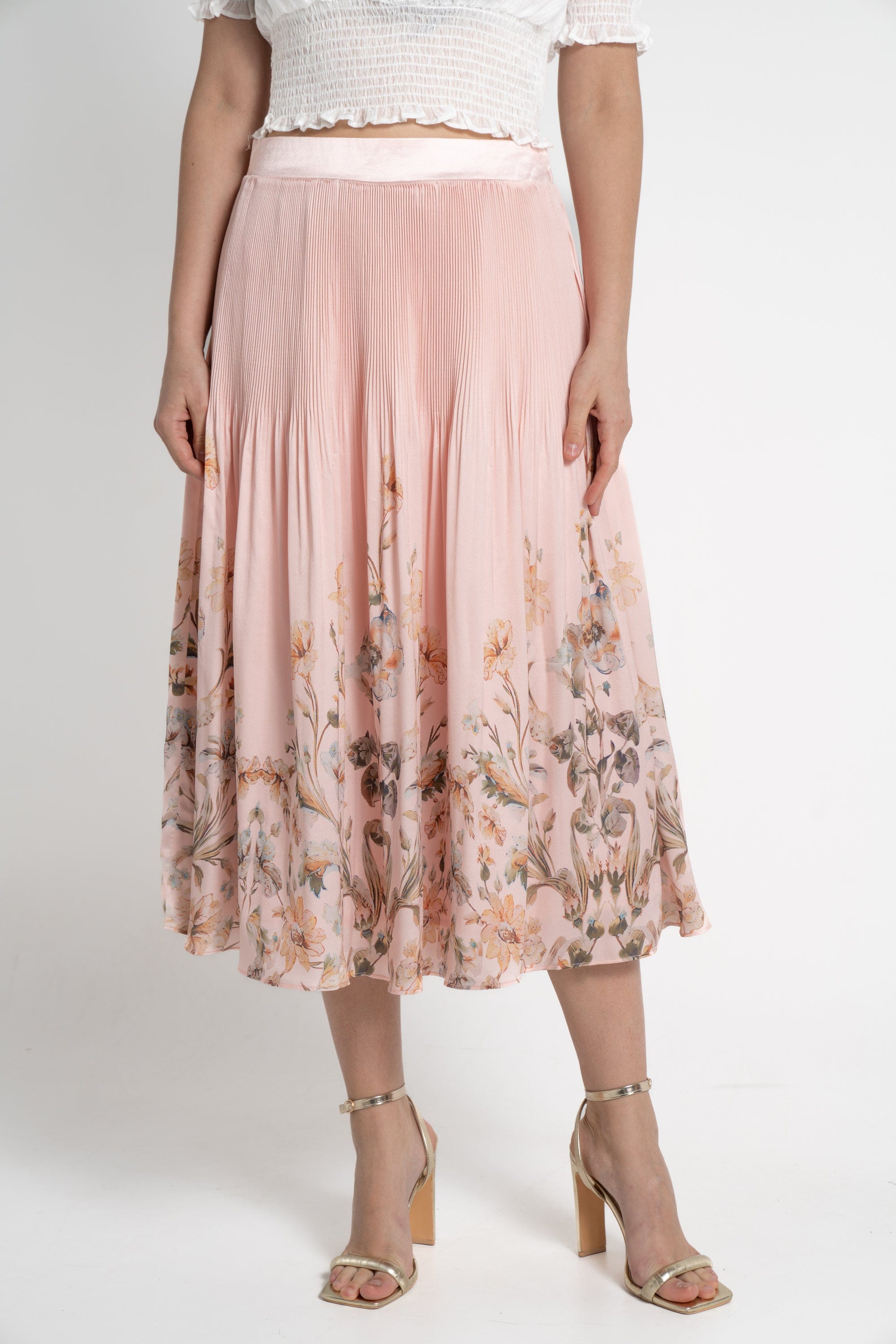 ميكا تنورة ميدي منقوشة بنقشة ورود نسائي وردي فاتح