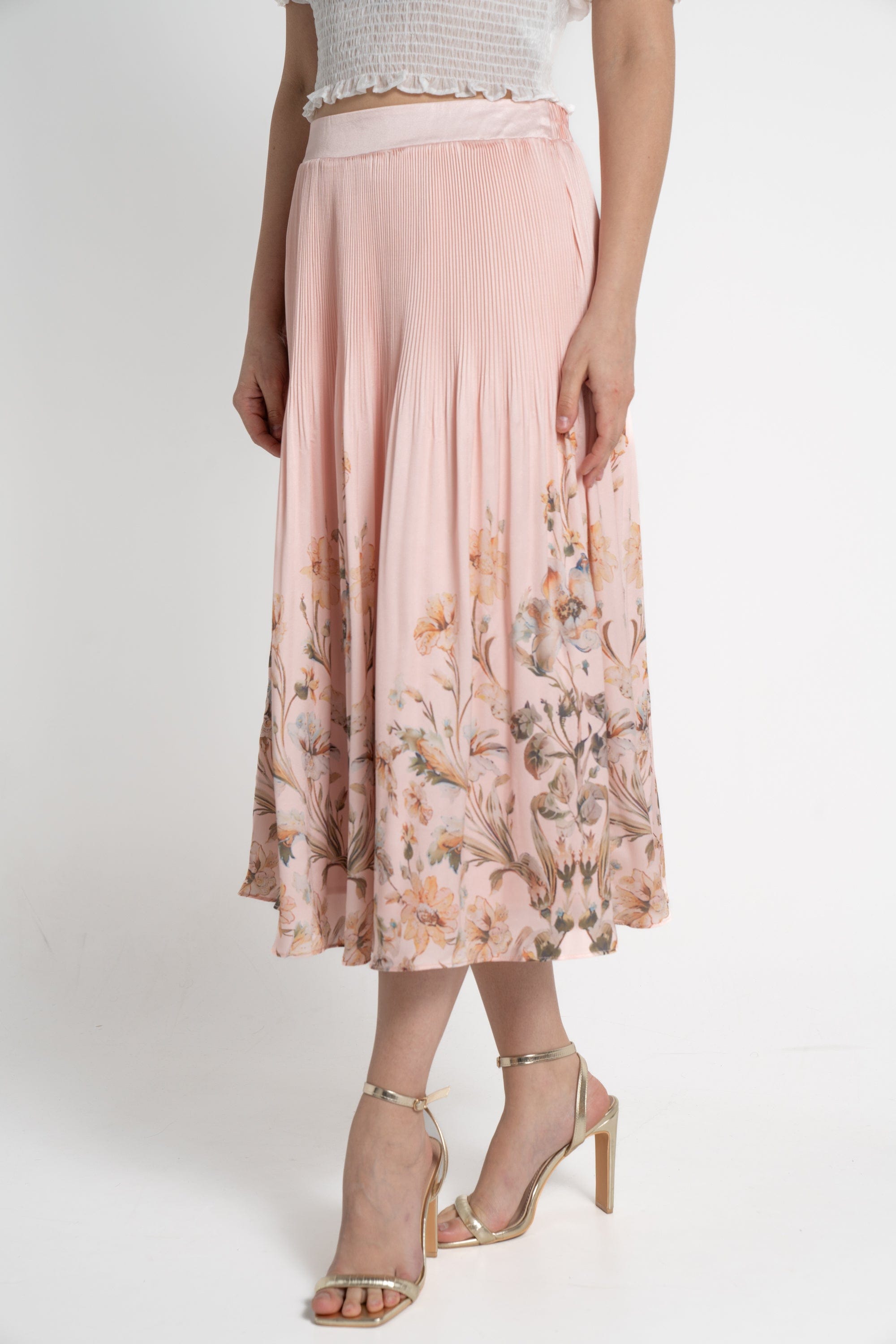 ميكا تنورة ميدي منقوشة بنقشة ورود نسائي وردي فاتح