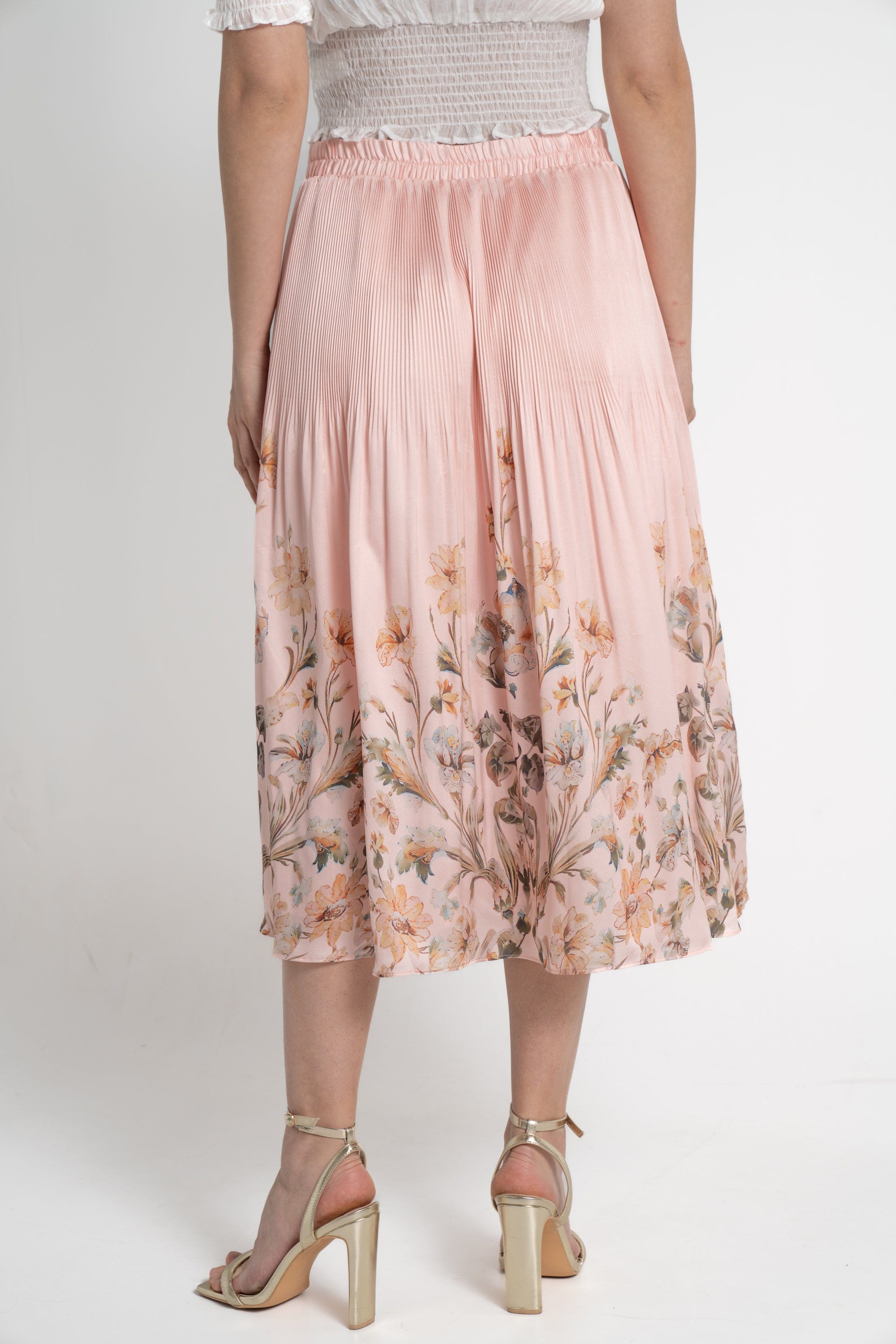 ميكا تنورة ميدي منقوشة بنقشة ورود نسائي وردي فاتح