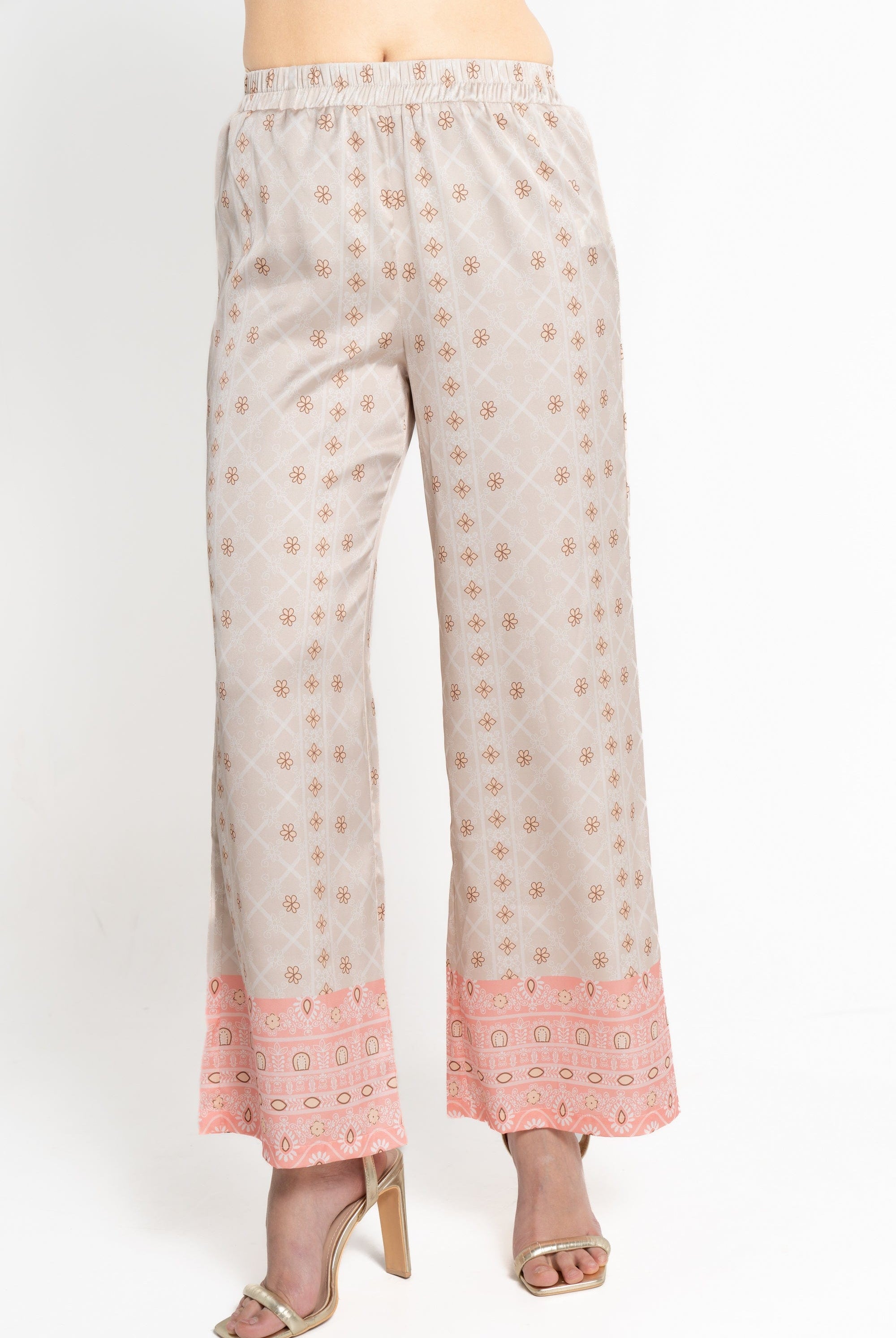 ميكا بنطلون طويل منقوش بنقشة ورود بيج