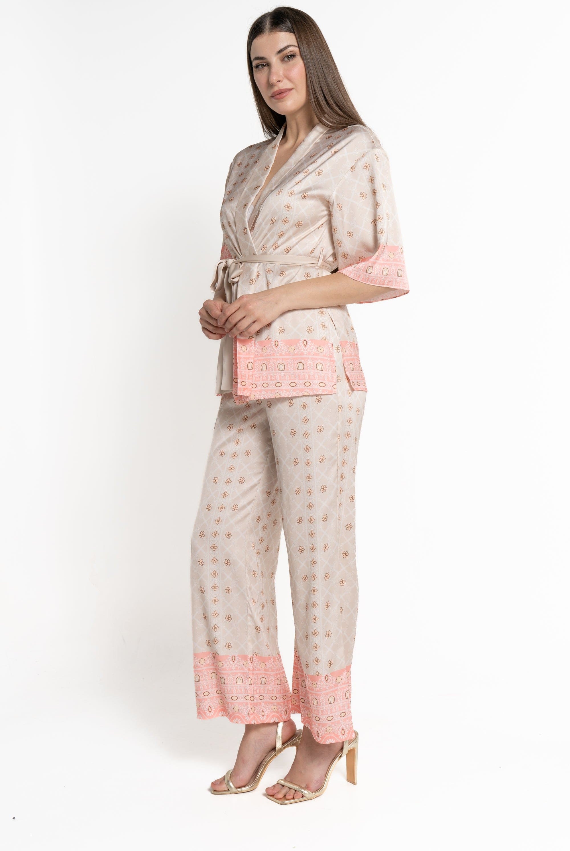 ميكا بنطلون طويل منقوش بنقشة ورود بيج