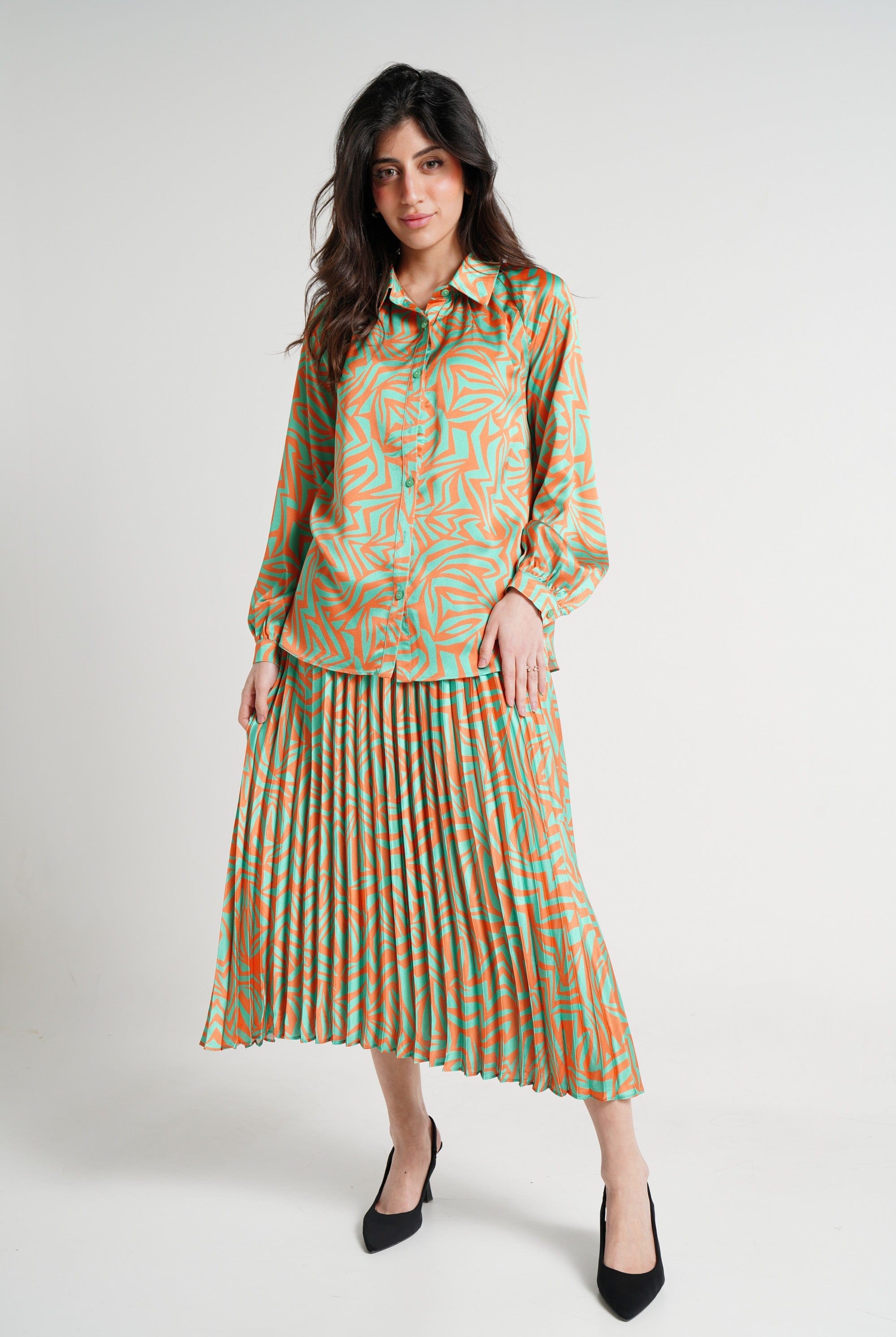 ميكا تنورة ميدي نسائية مطبوعة بكسرات