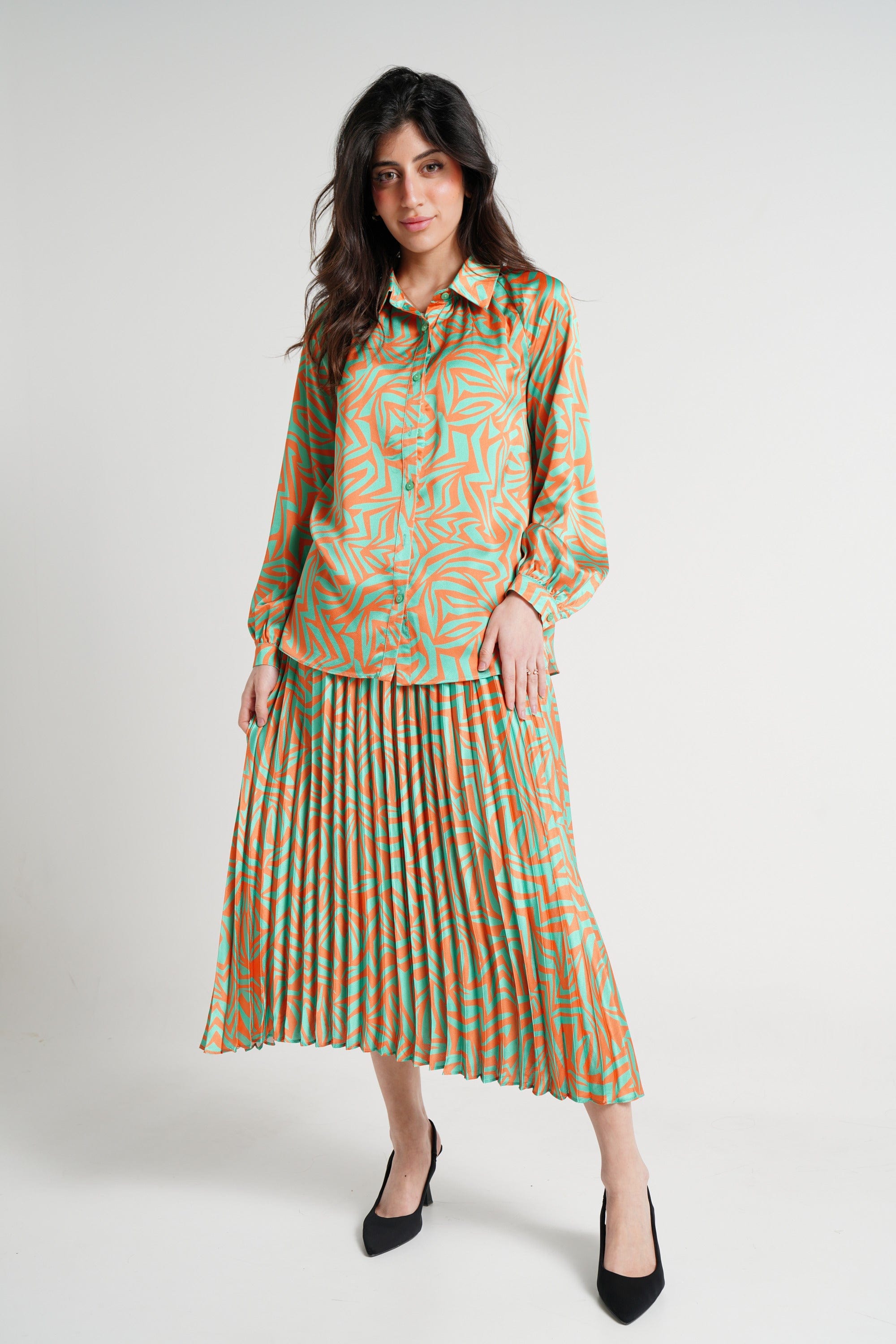 ميكا تنورة ميدي نسائية مطبوعة بكسرات