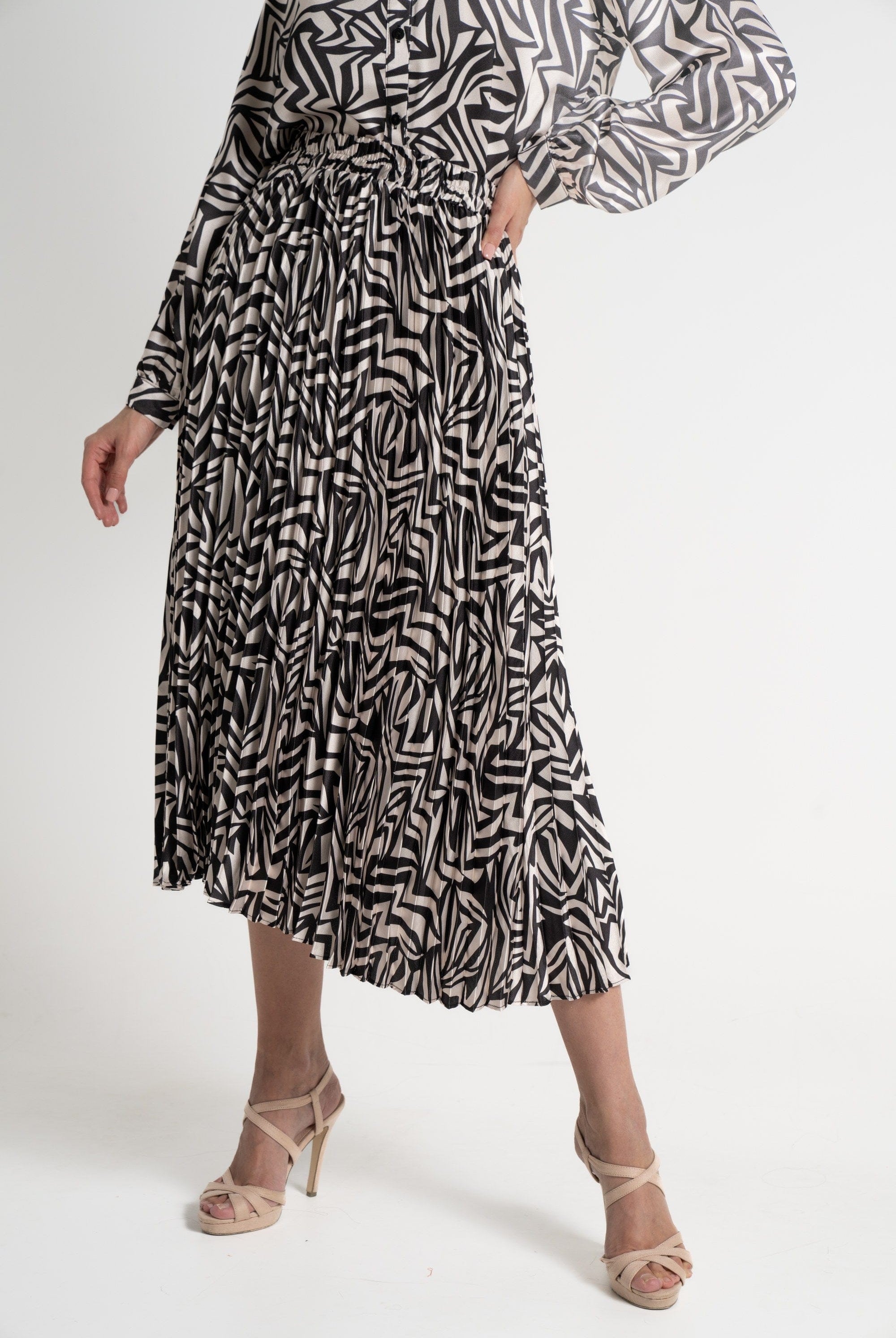 ميكا تنورة ميدي نسائية مطبوعة بكسرات