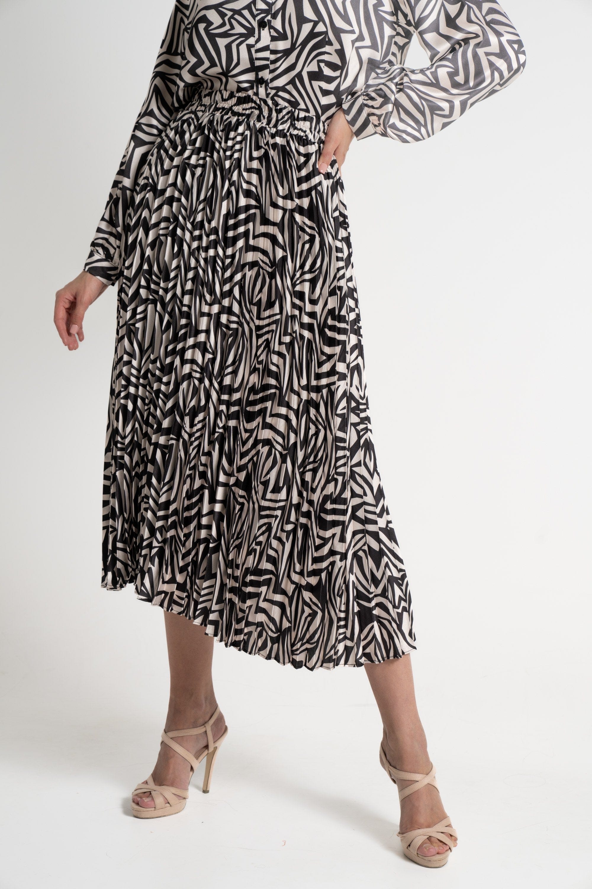 ميكا تنورة ميدي نسائية مطبوعة بكسرات