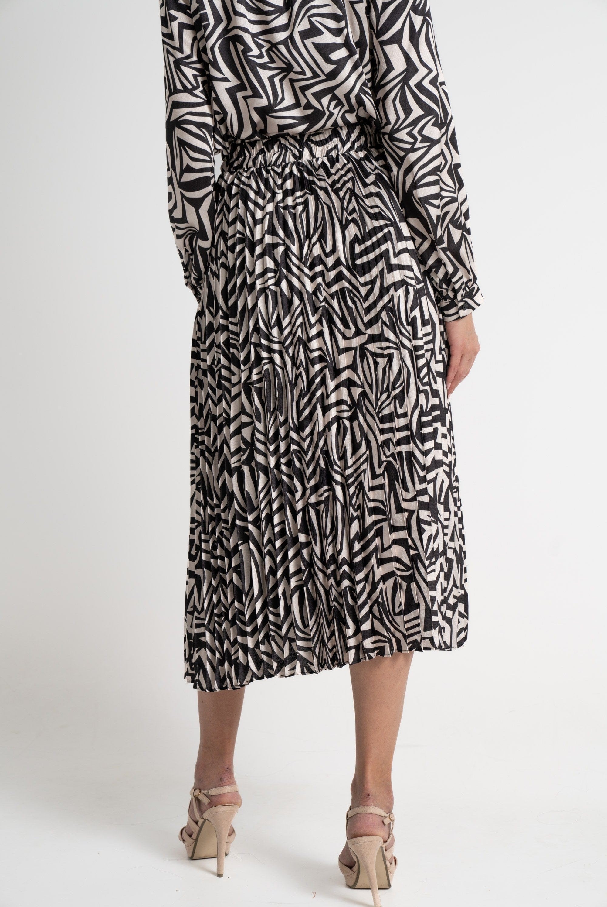 ميكا تنورة ميدي نسائية مطبوعة بكسرات