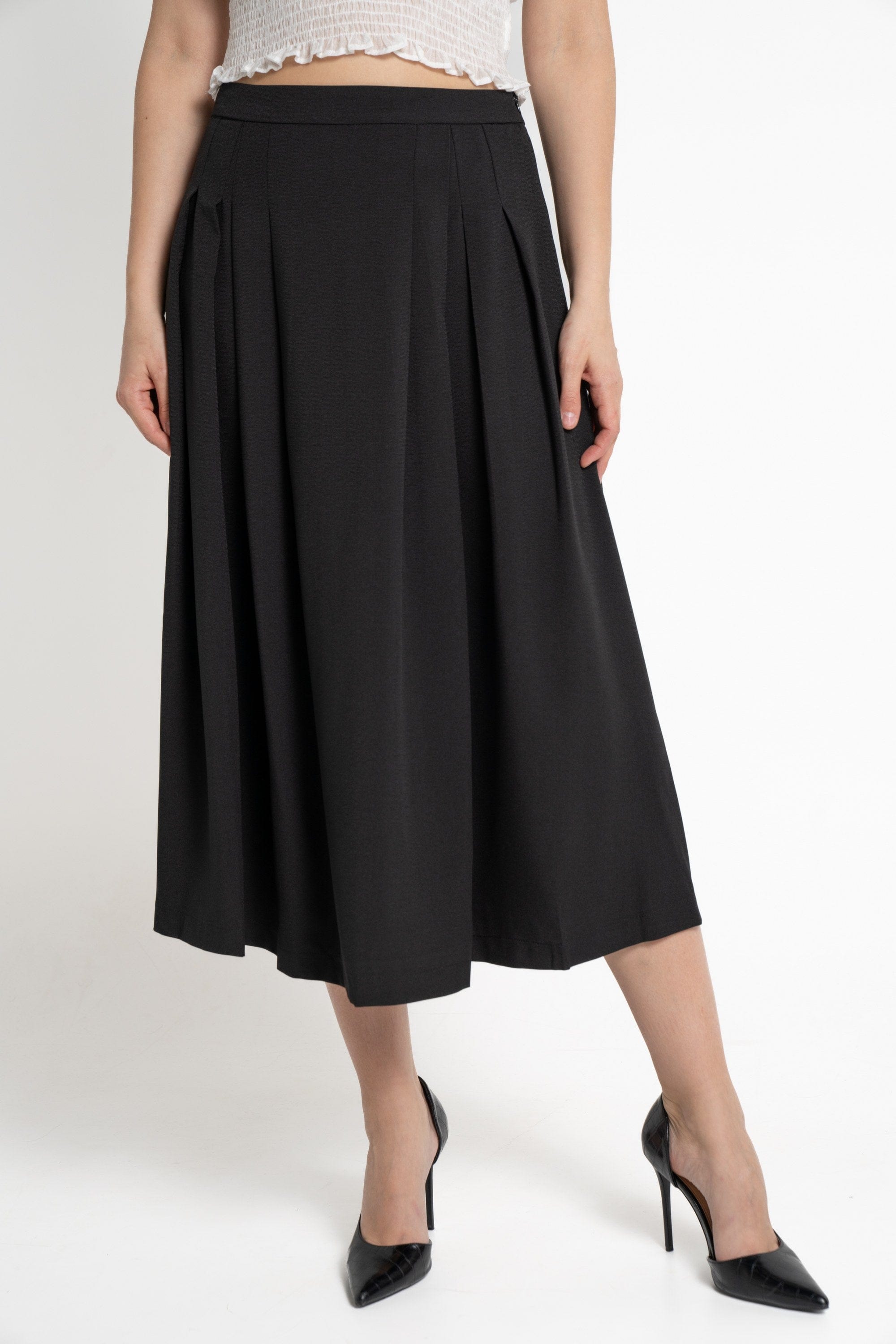 ميكا تنورة ميدي نسائية سادة بكسرات