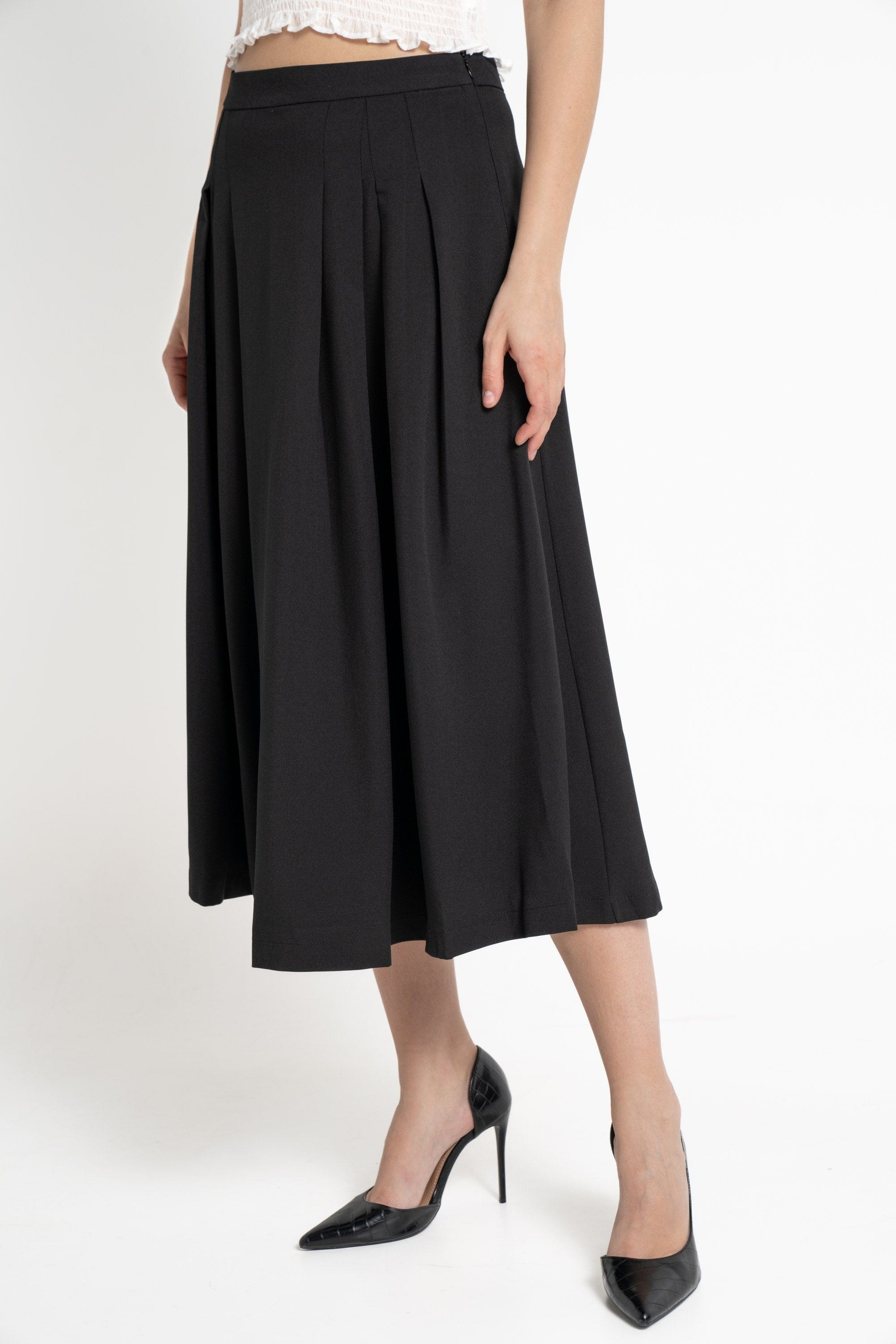 ميكا تنورة ميدي نسائية سادة بكسرات