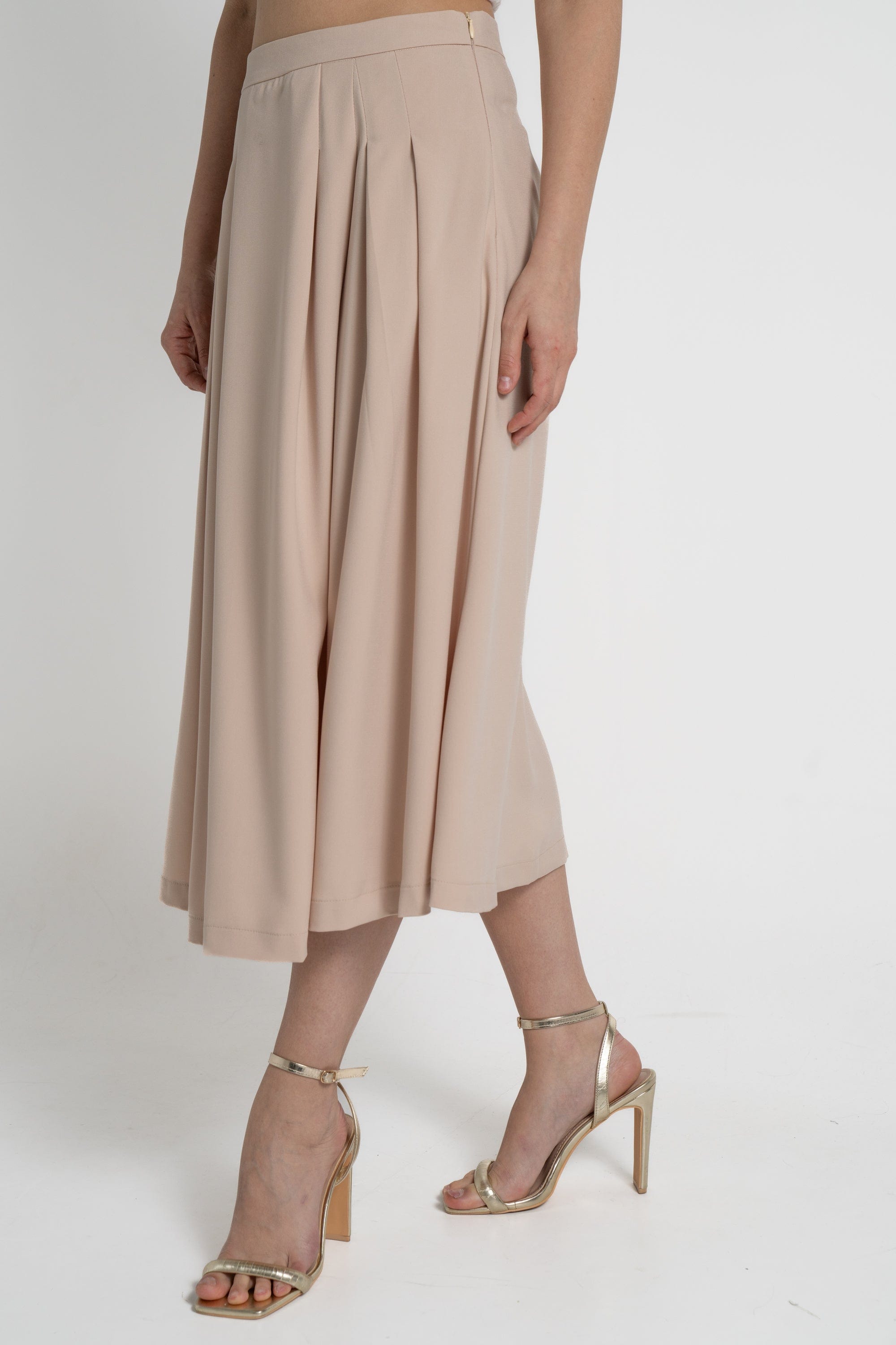 ميكا تنورة ميدي نسائية سادة بكسرات